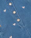 Salopette in jeans con ricami cuori neonata