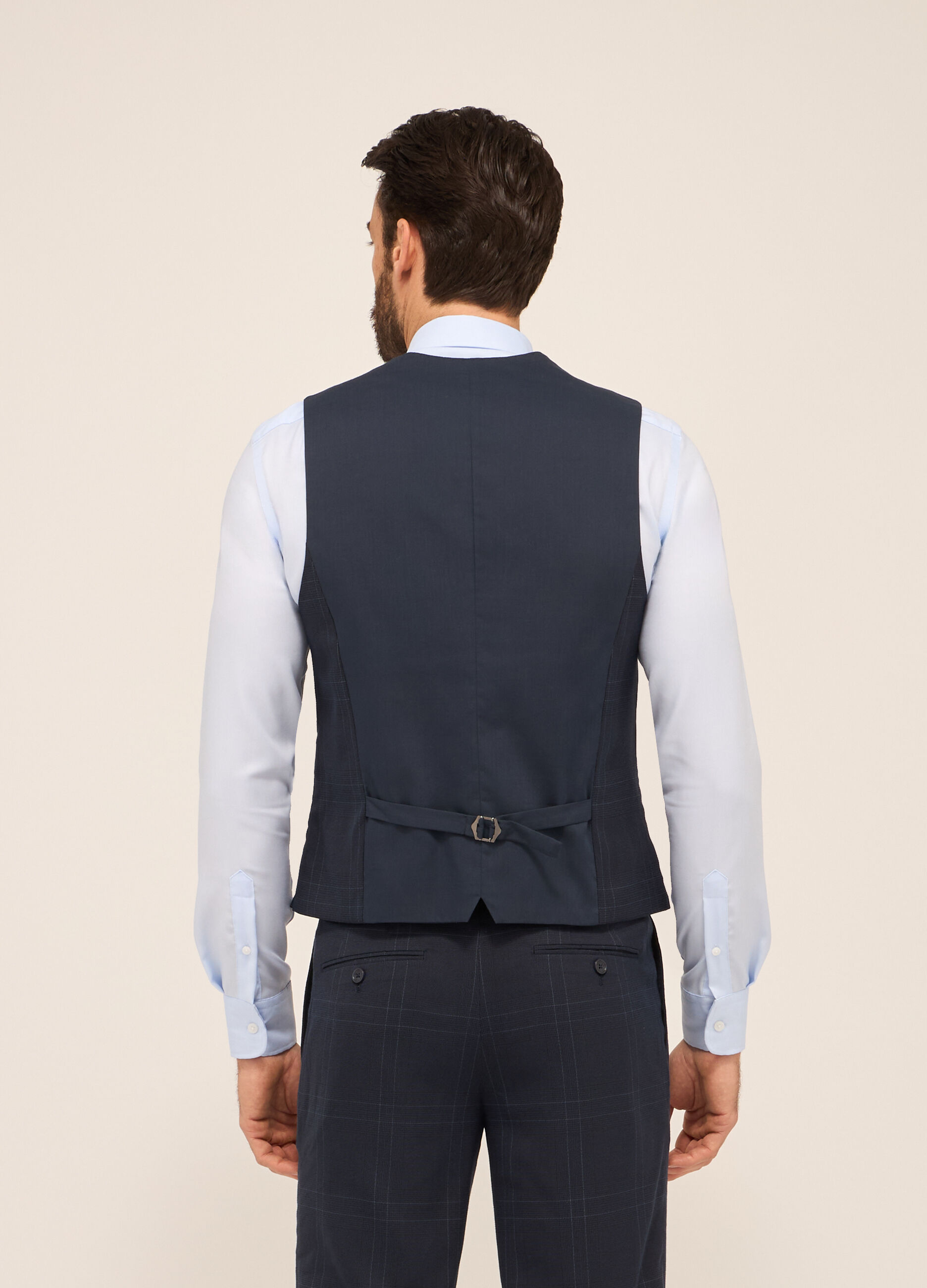 Gilet con bottoni in tessuto stretch a quadri uomo_1