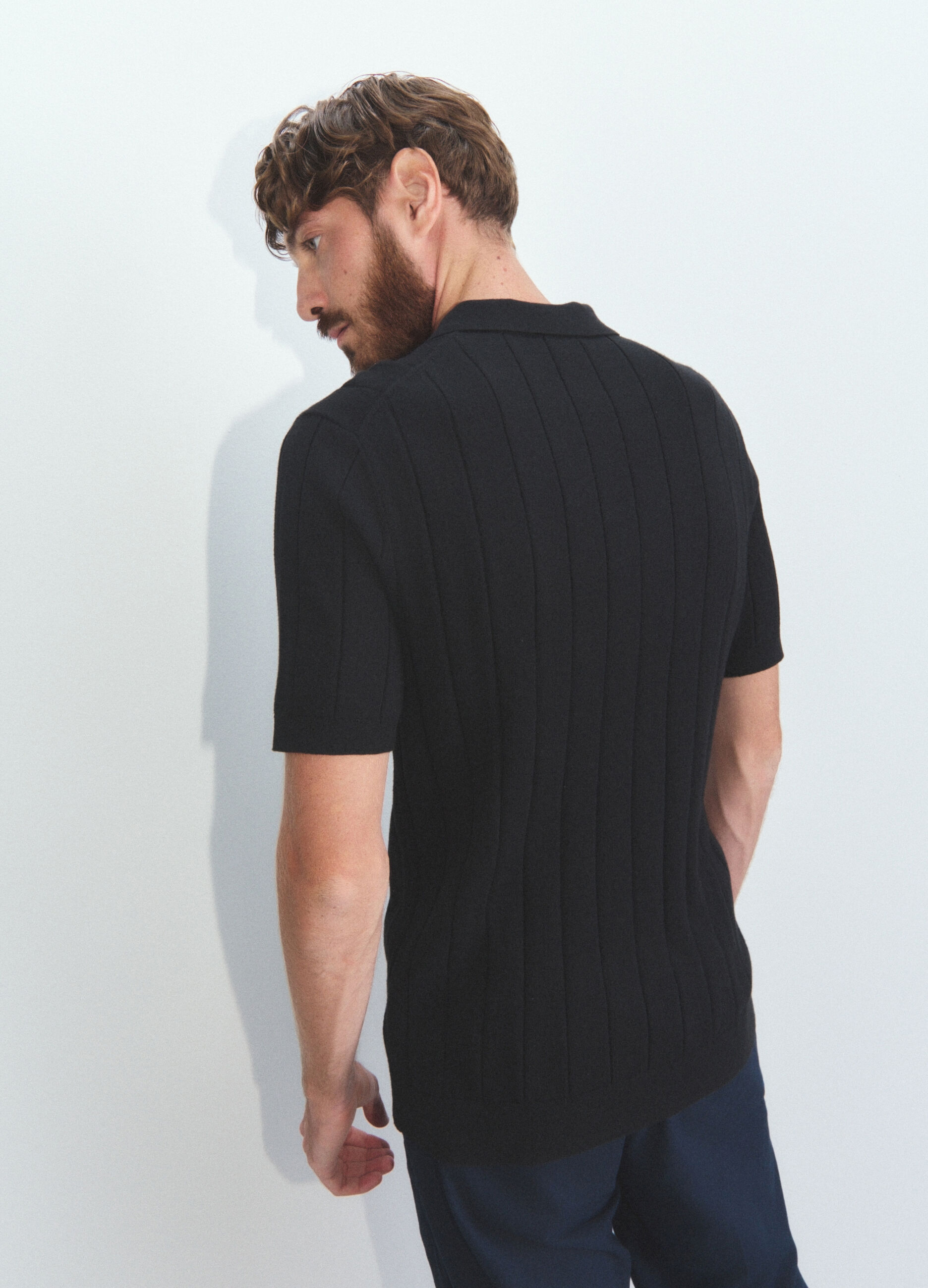 Polo a maniche corte in maglia a costa piatta uomo