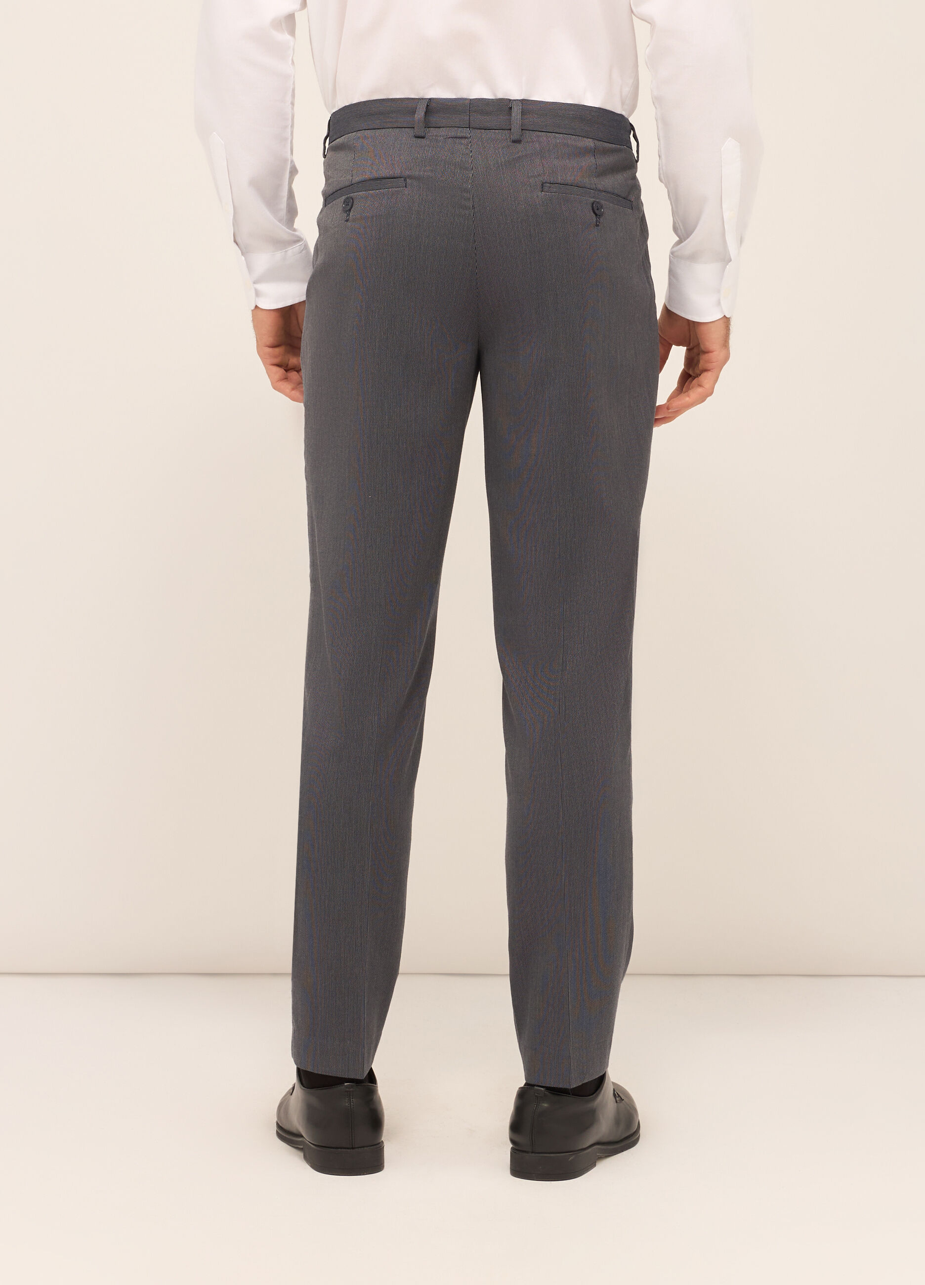 Pantaloni classici in tessuto stretch motivo optical uomo_1