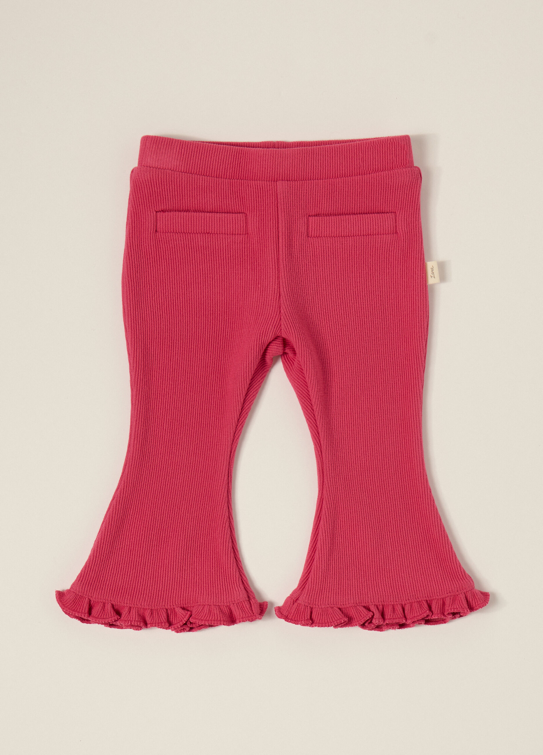 Pantaloni rosa elasticizzati con volant_1