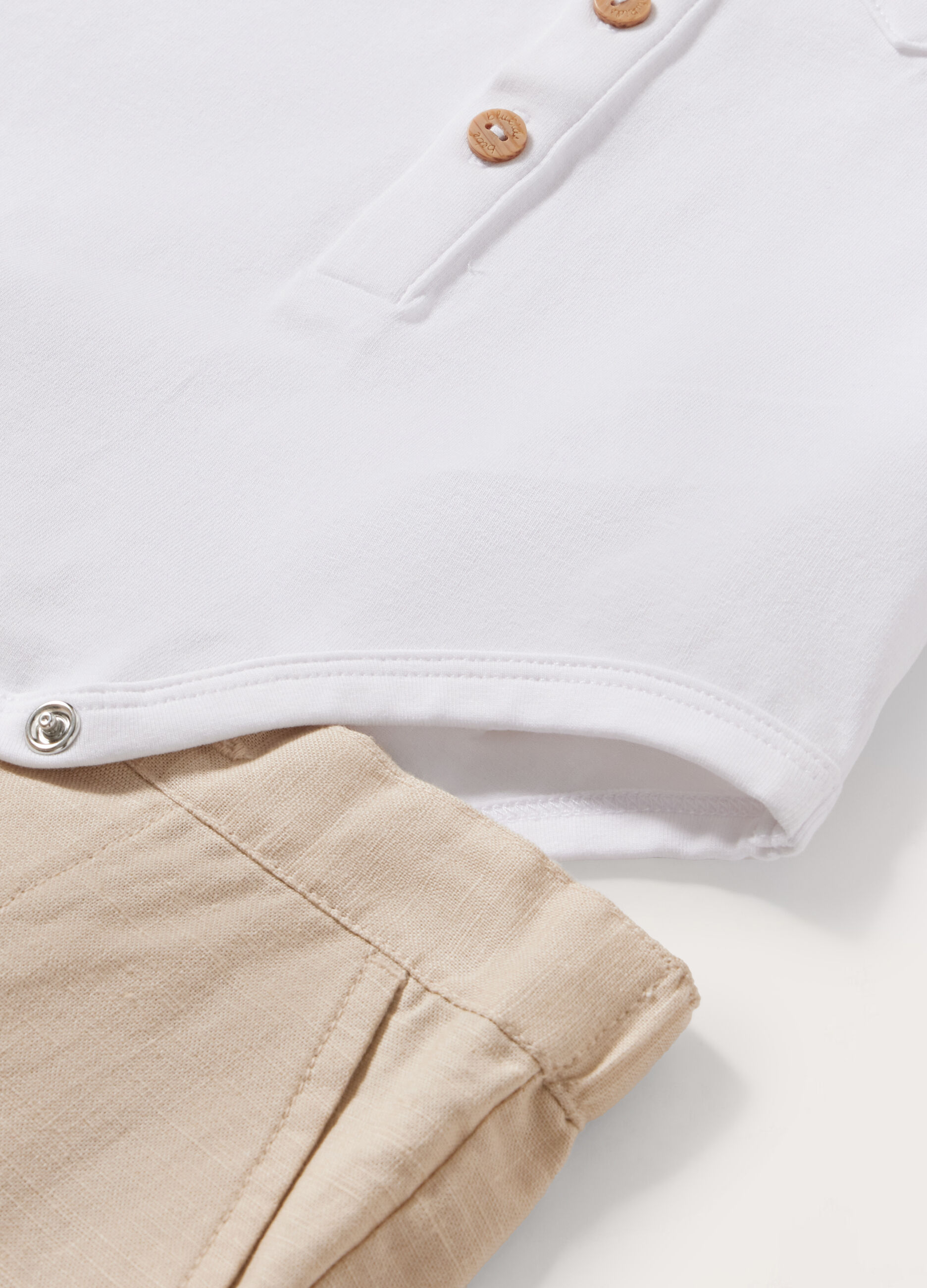 Completino in jersey stretch con body e pantalone neonato