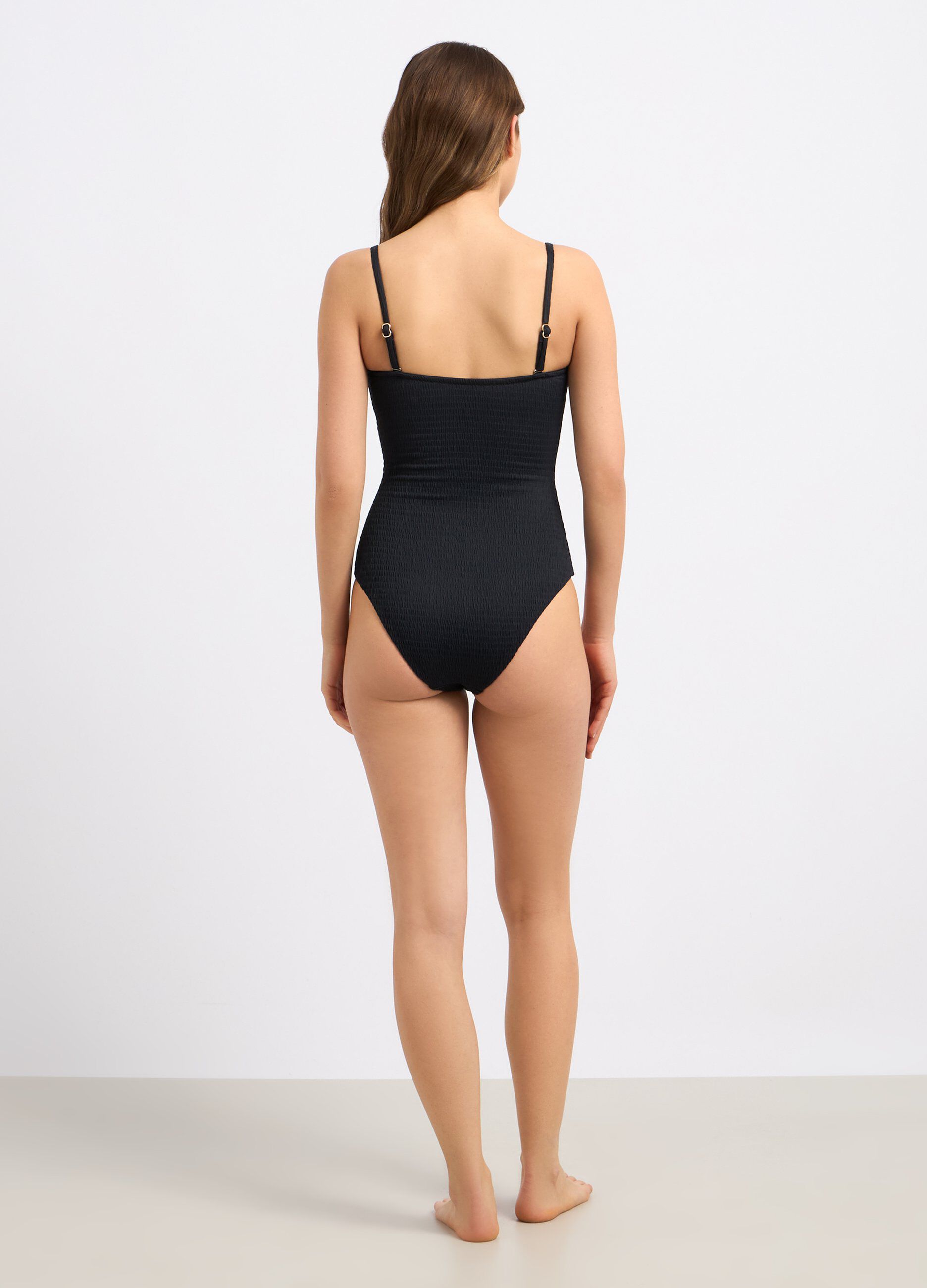 Costume intero con cut out e applicazioni donna_1