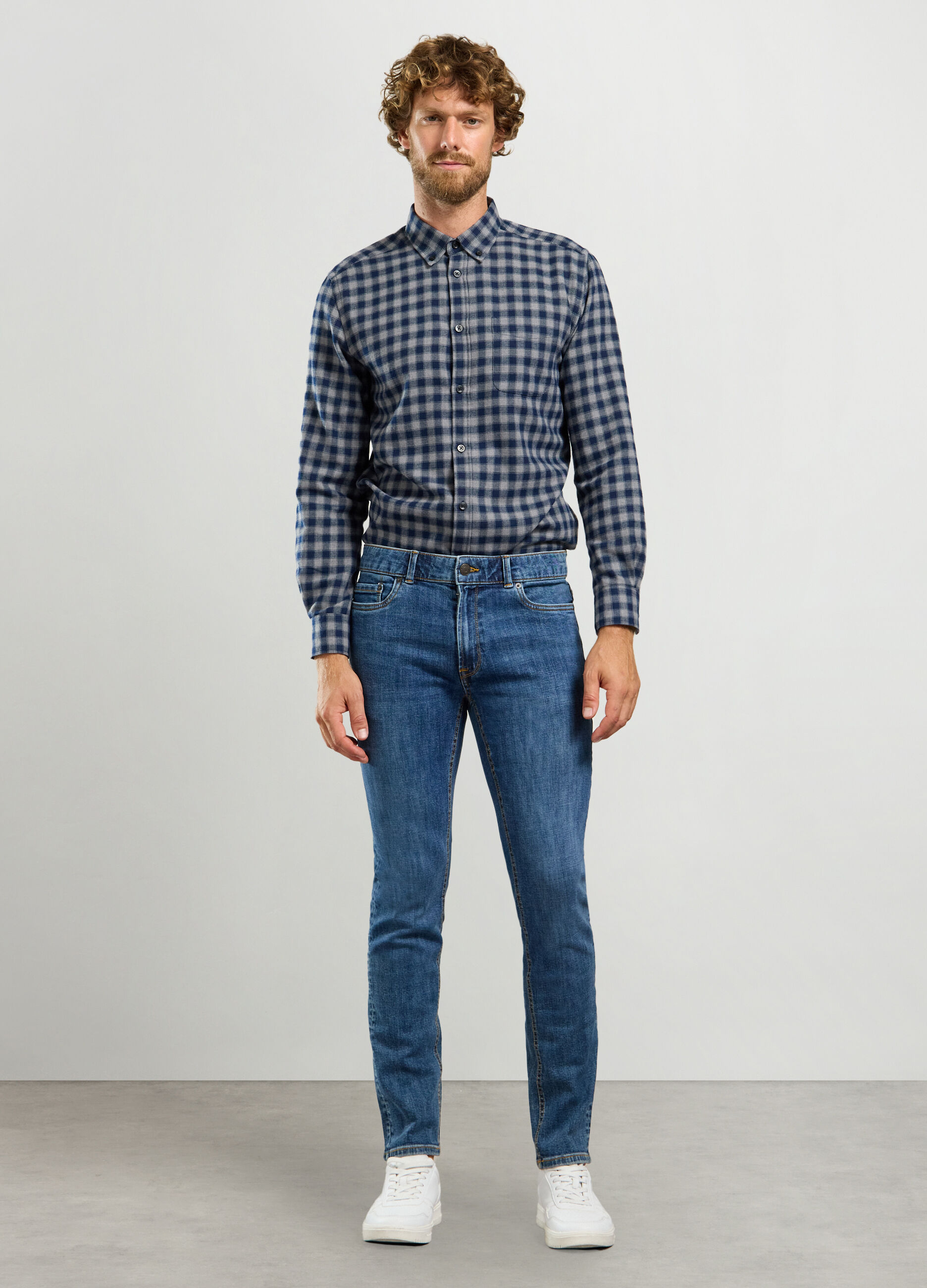 Jeans slim fit in denim di cotone stretch uomo_0