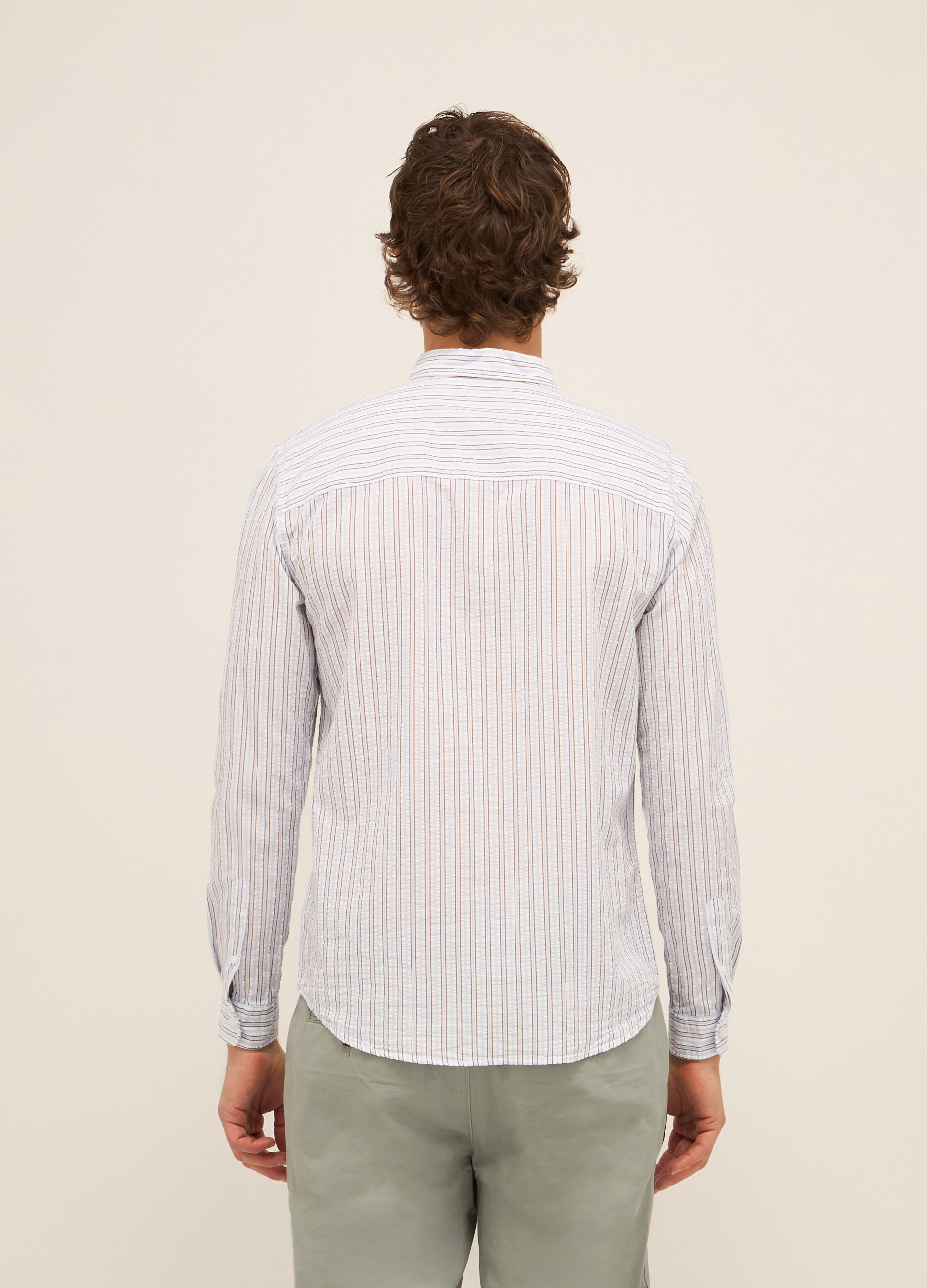 Camicia slim fit in seersucker di cotone a righe uomo_1