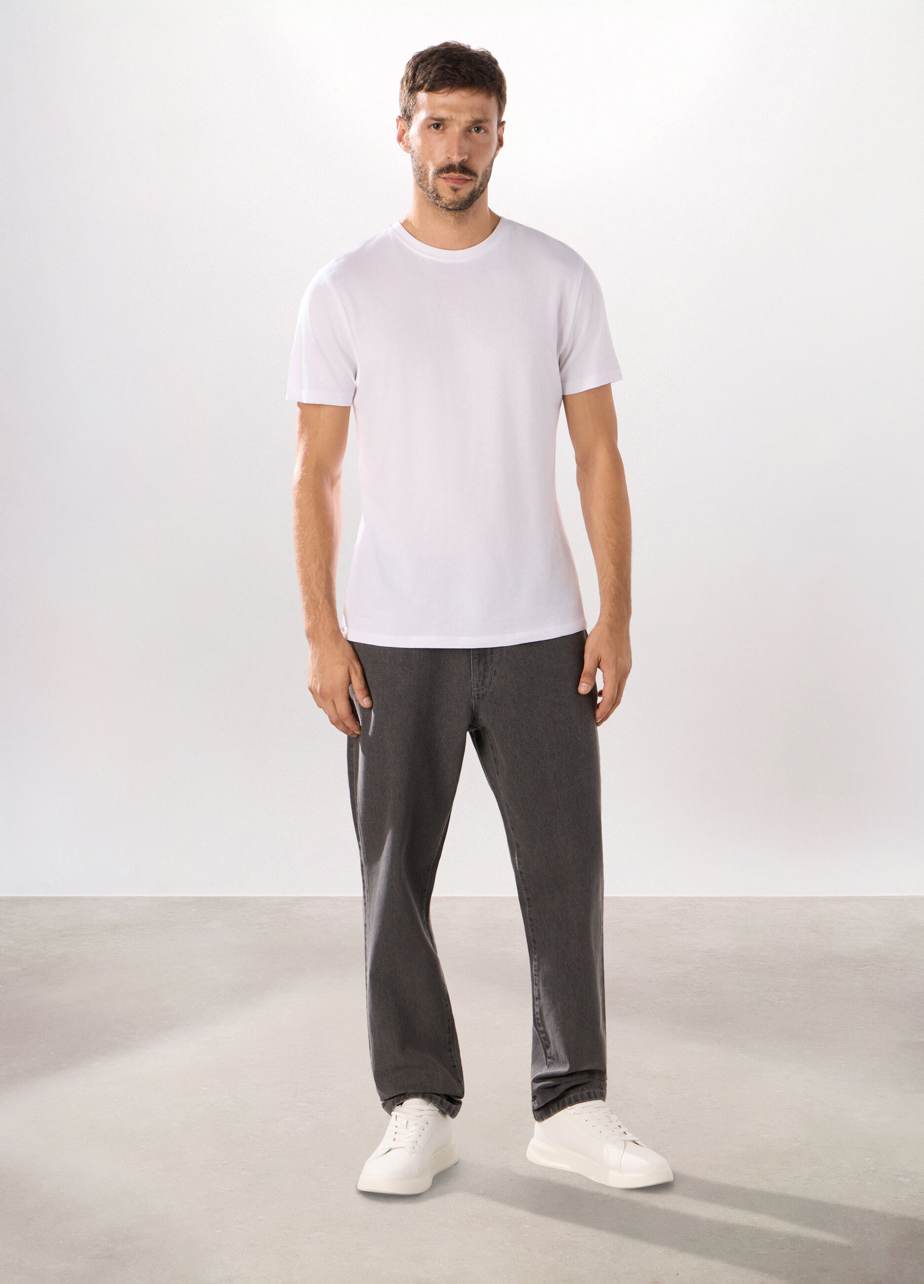 Jeans 5 tasche regular in denim di cotone uomo_0