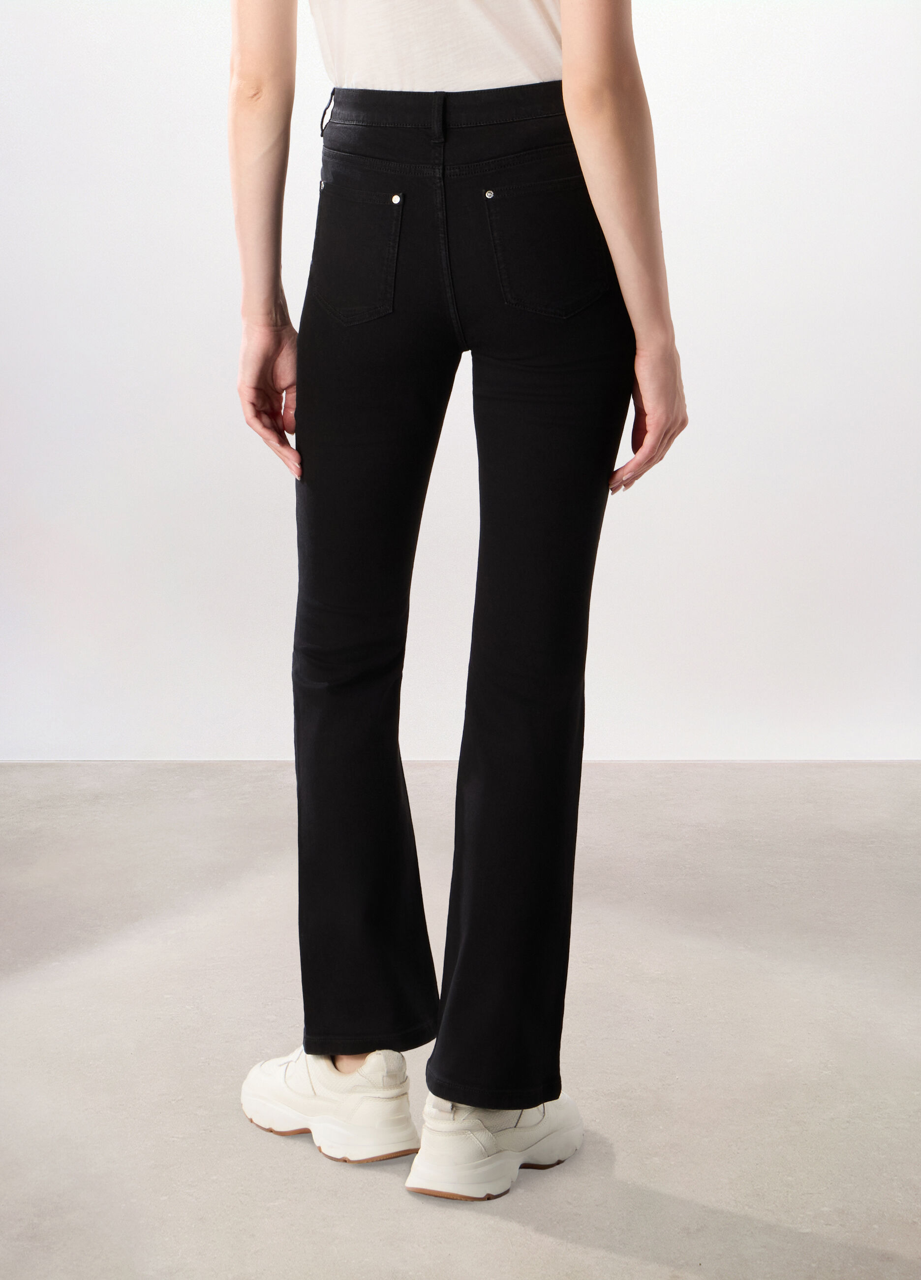 Pantaloni in denim misto cotone donna_1