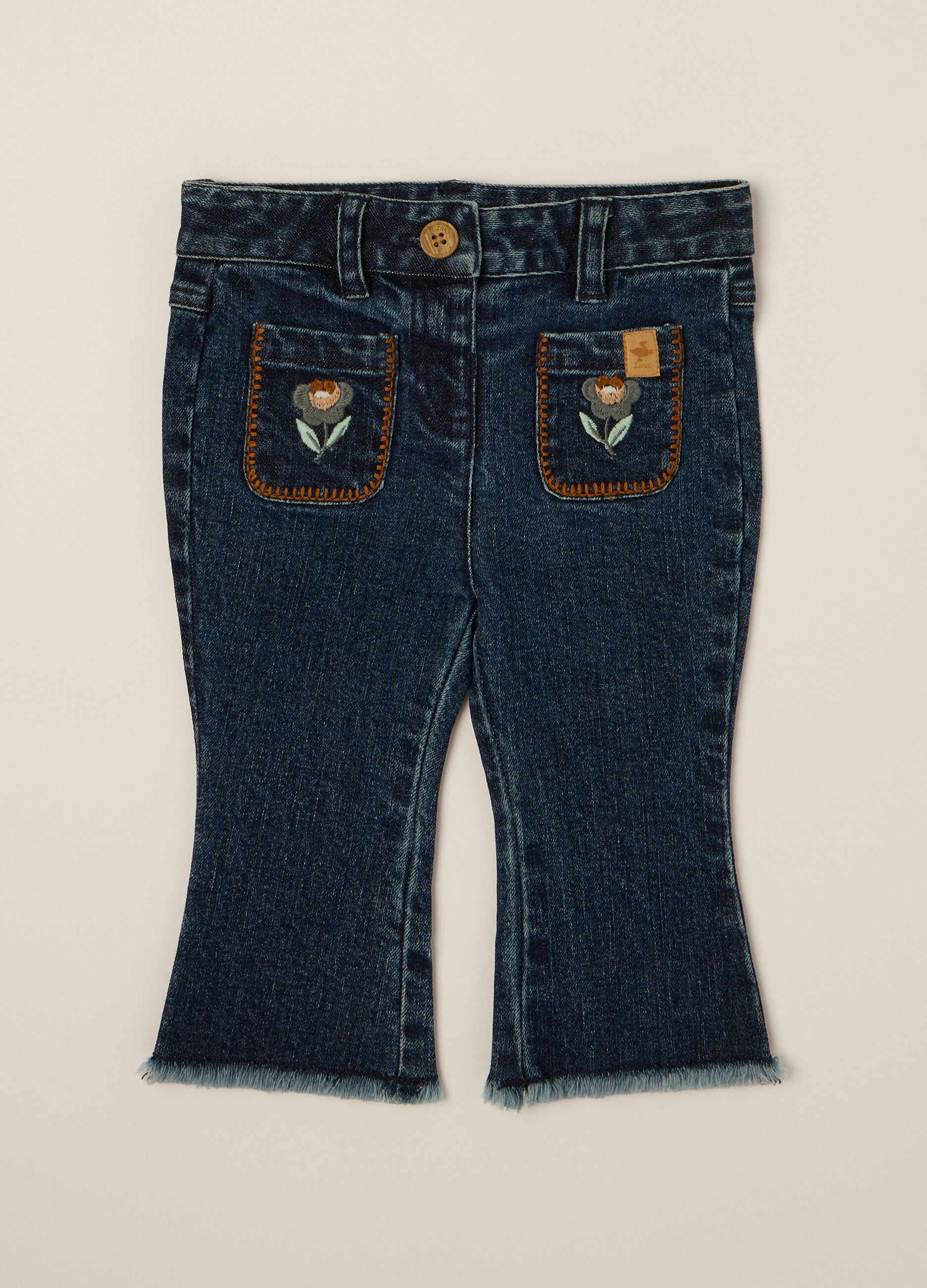 Pantaloni denim elasticizzati a zampa_0