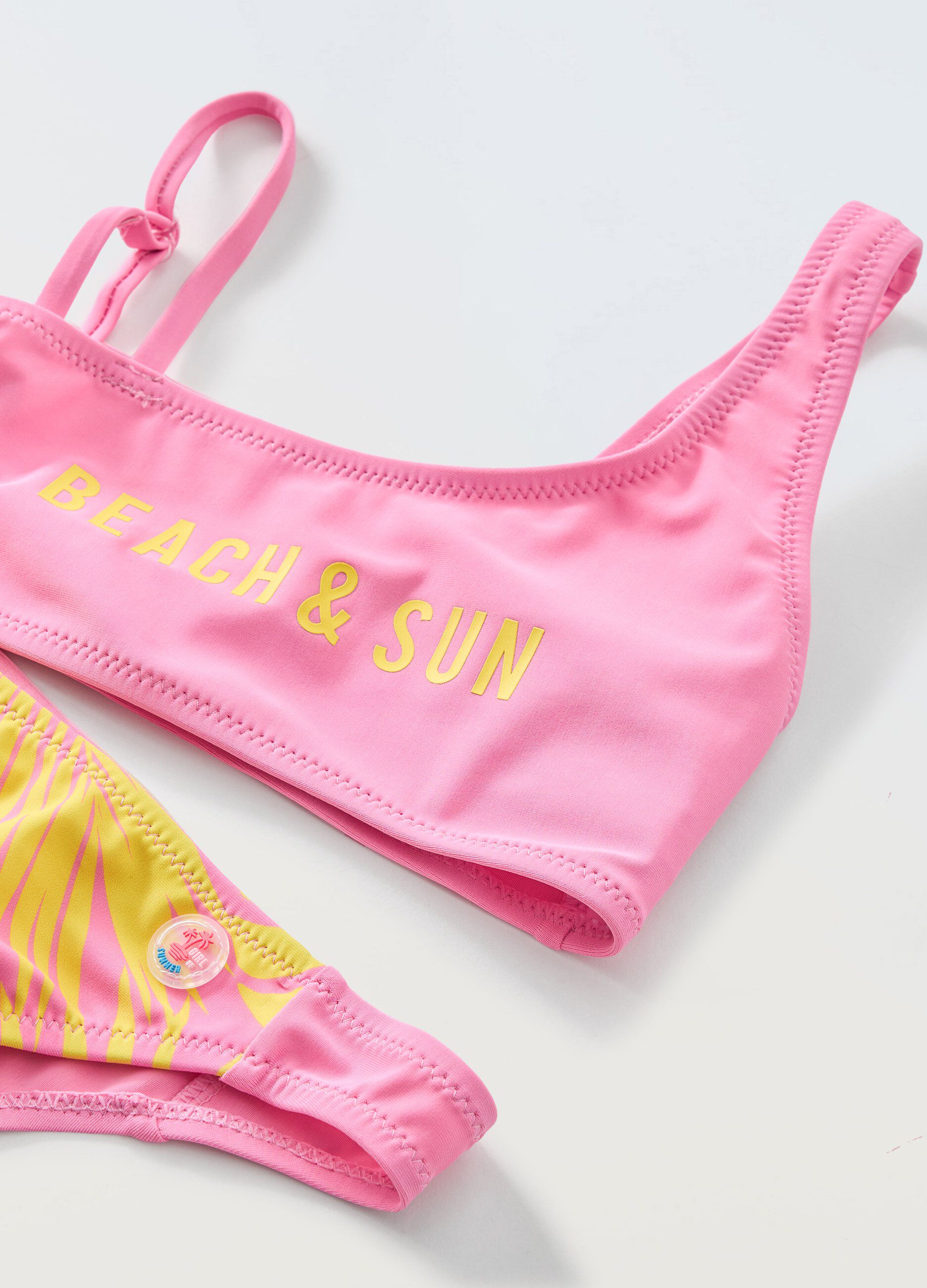 Bikini asimmetrico con stampa ragazza_1