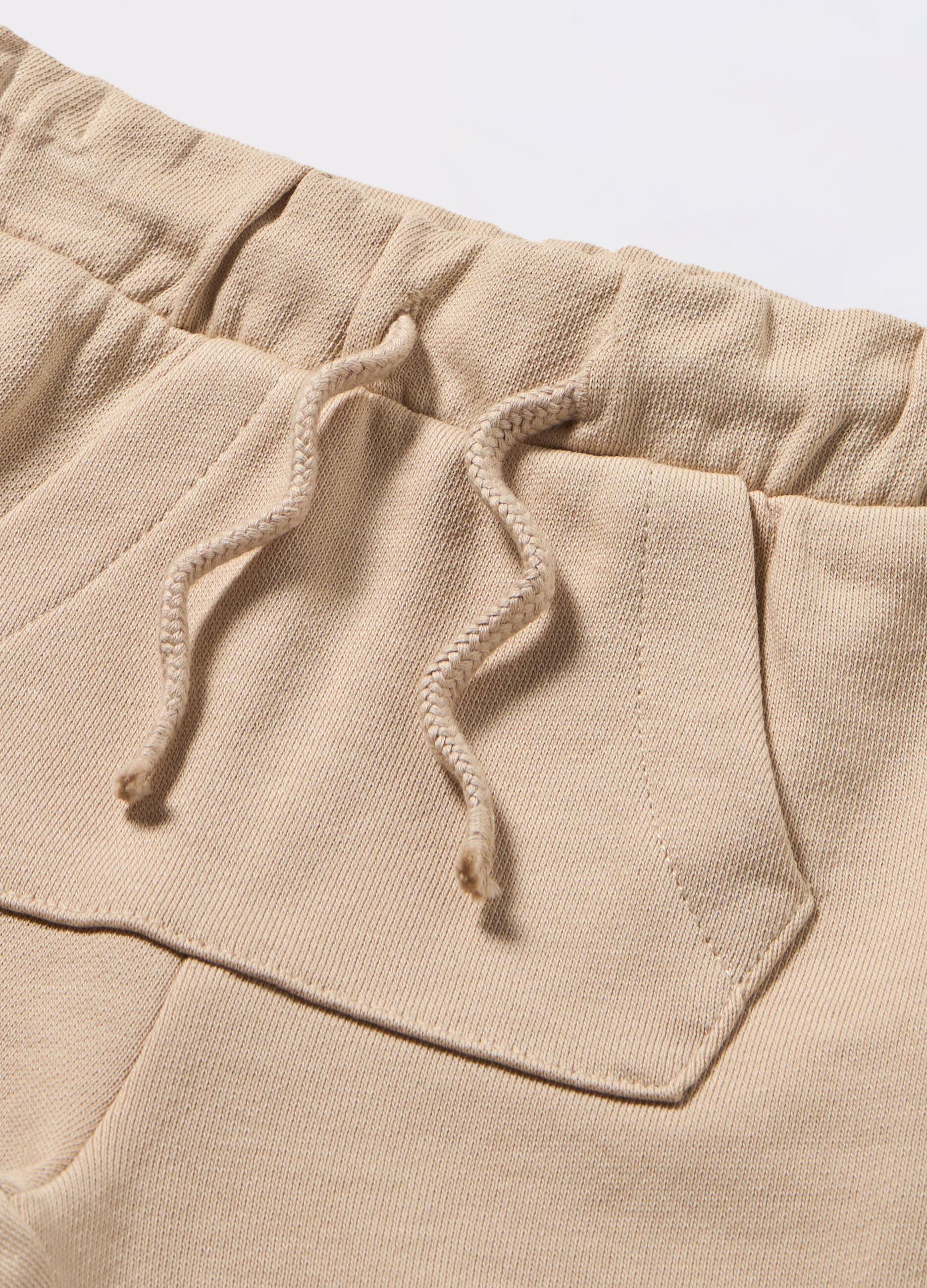 Jogger in french terry di puro cotone neonato_1