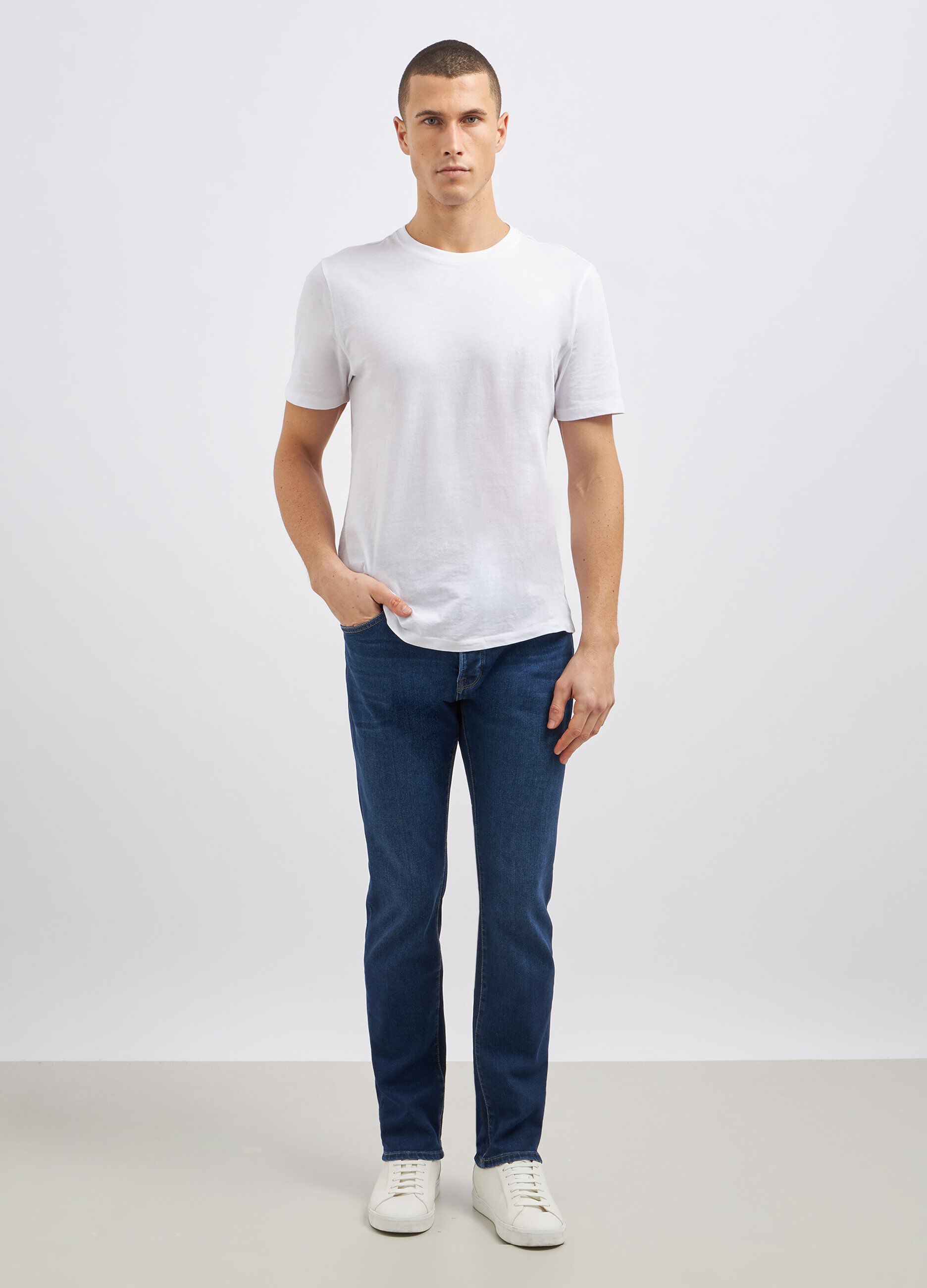 Pantaloni in denim di misto cotone uomo_0