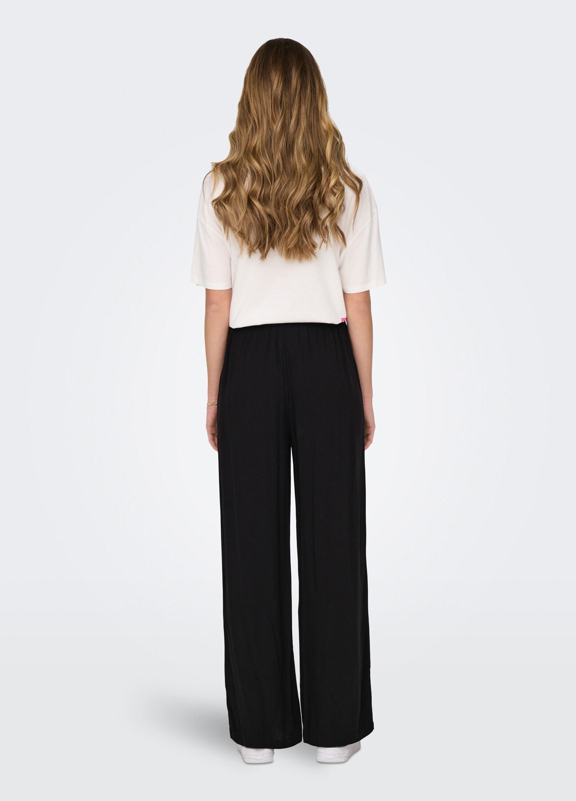 Pantaloni in tinta unita donna_1