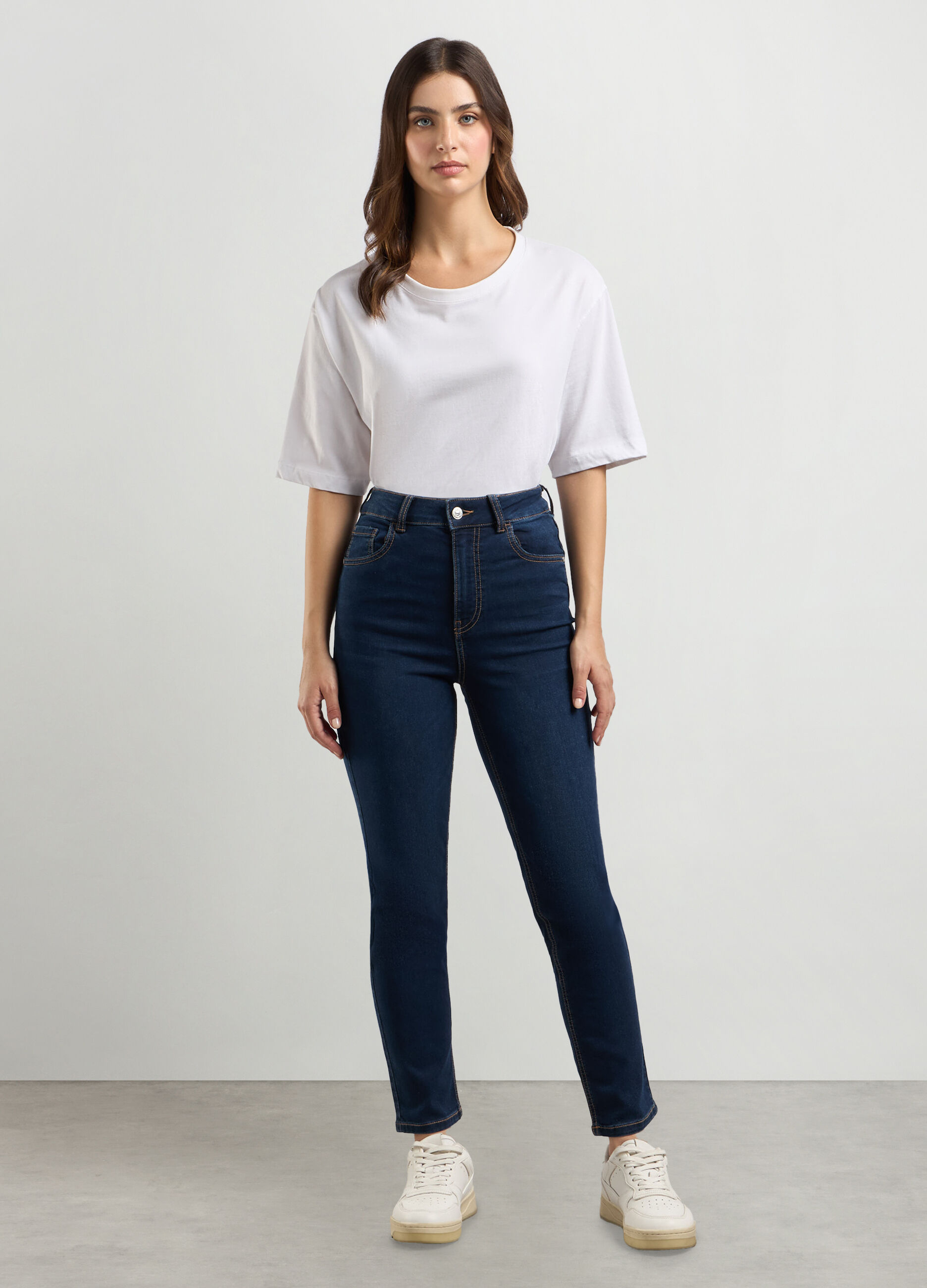 Pantaloni in denim di misto cotone stretch donna_0
