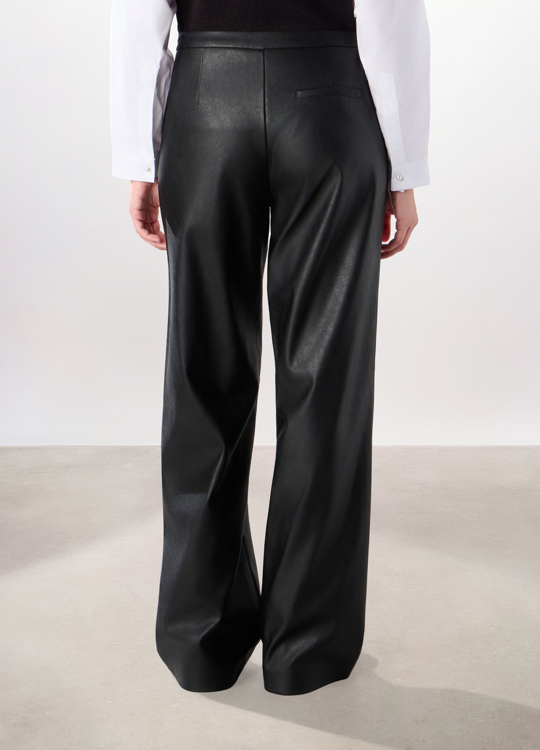 Pantaloni in eco pelle donna_1