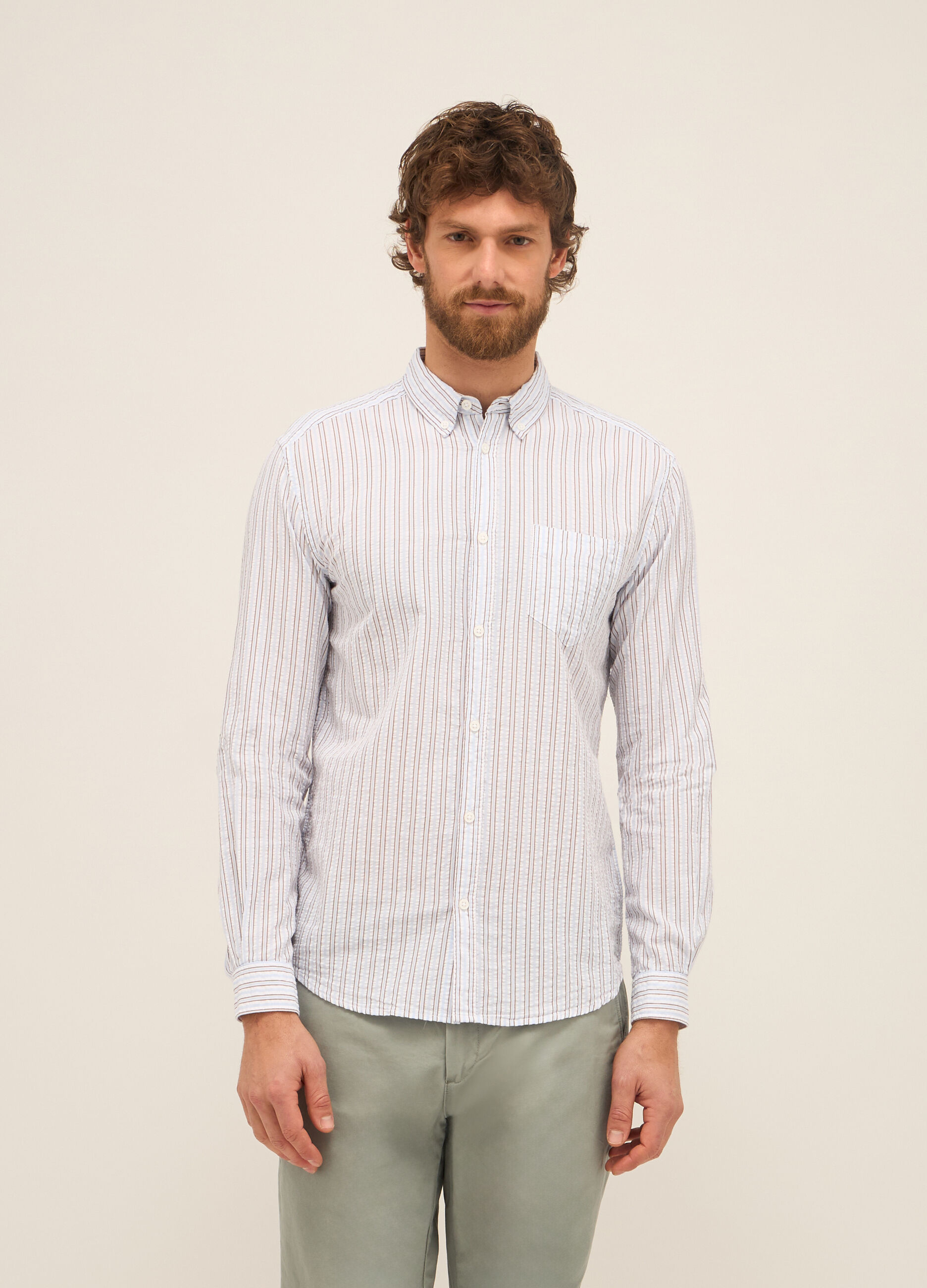 Camicia slim fit in seersucker di cotone a righe uomo_0