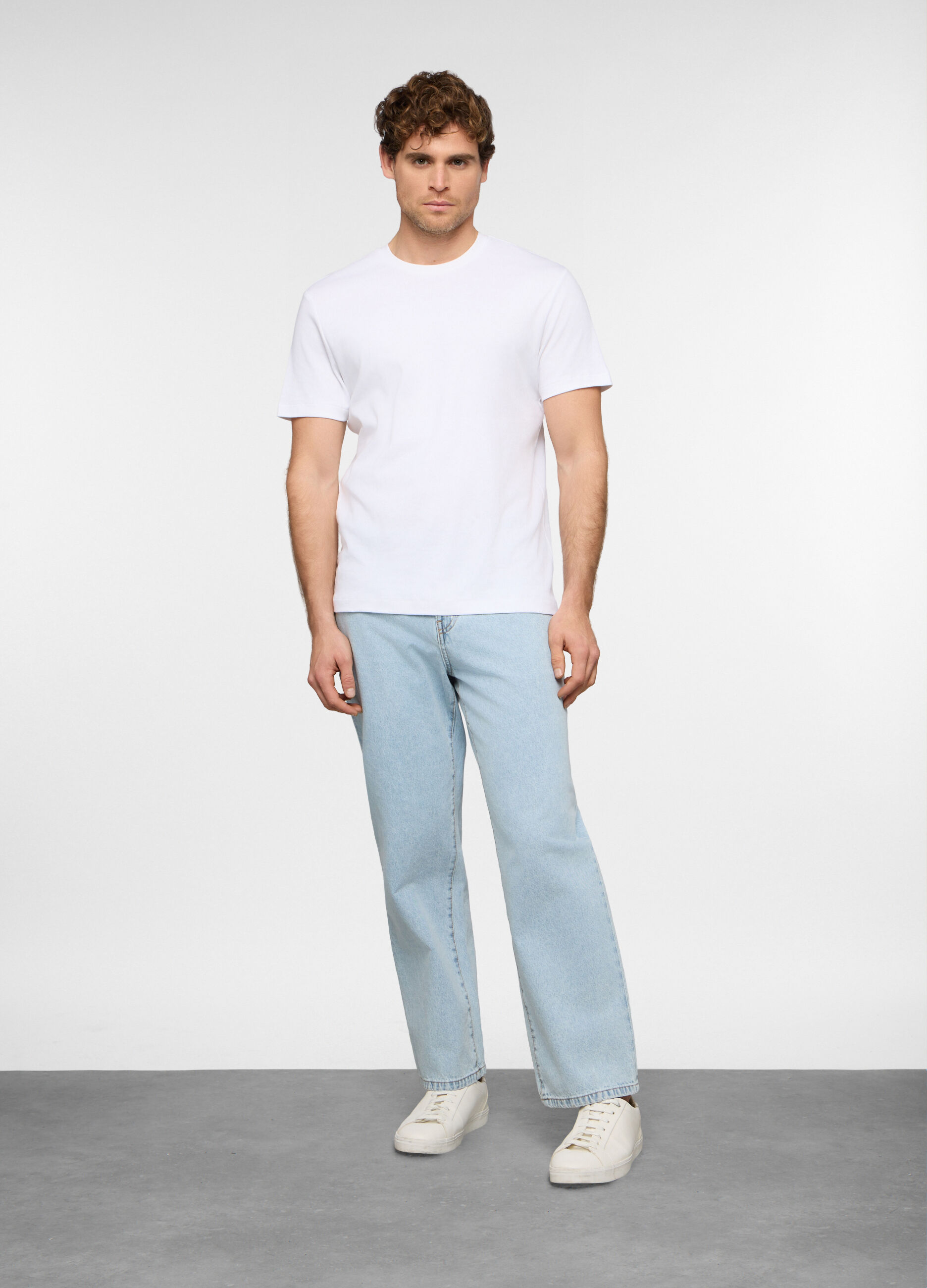 Jeans loose fit in denim di cotone uomo_0