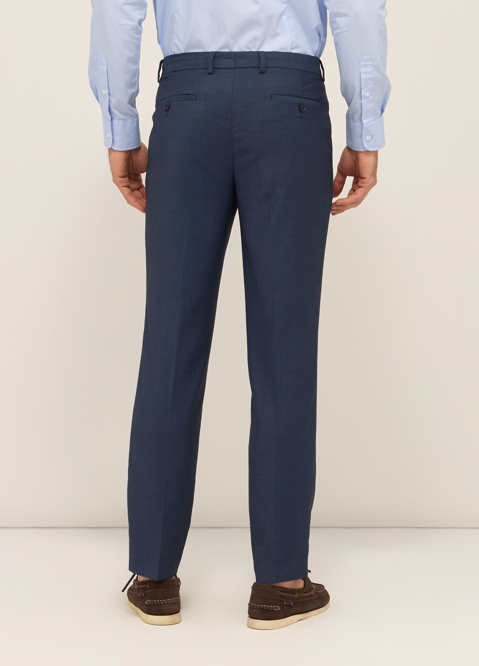 Pantaloni classici in tessuto stretch a spina di pesce uomo_1