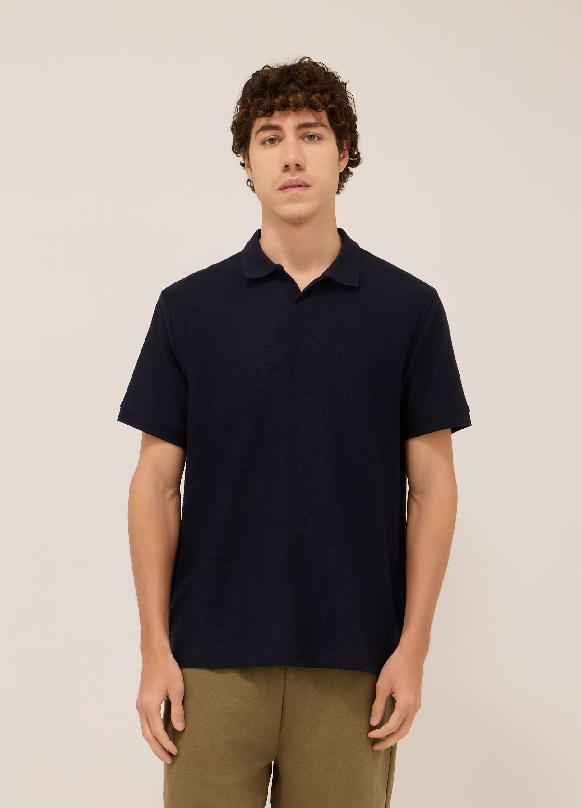 Polo in cotone a coste orizzontali uomo_0