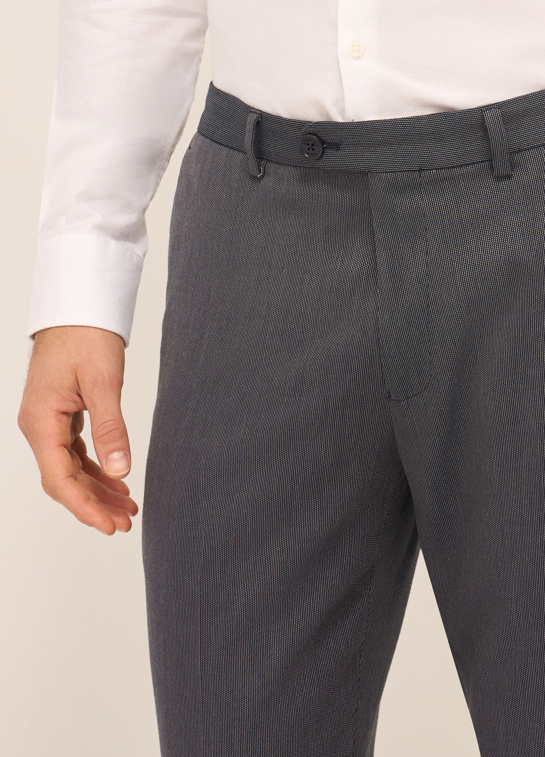 Pantaloni classici in tessuto stretch motivo optical uomo_2