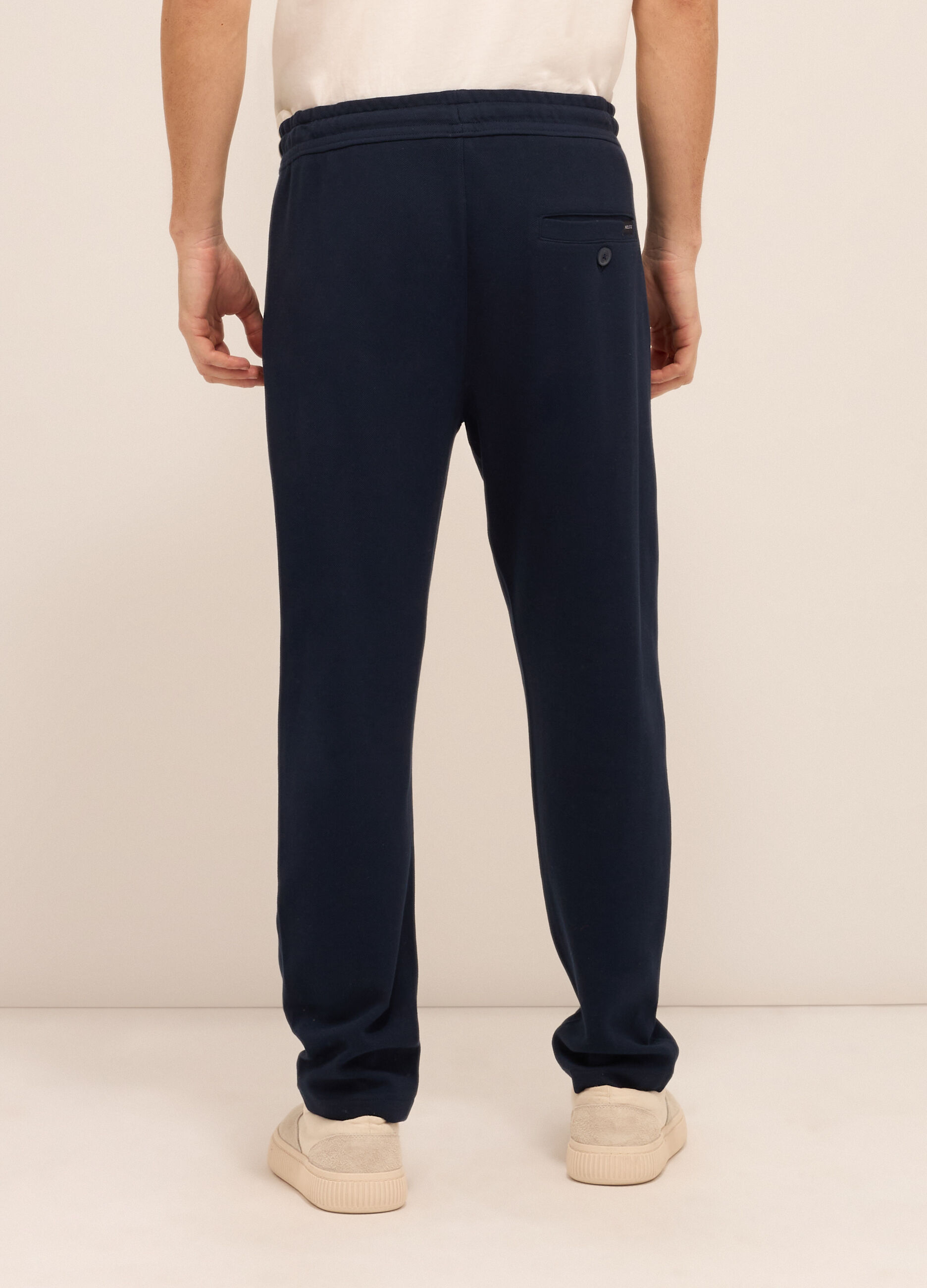 Jogger con piega in puro cotone uomo_1