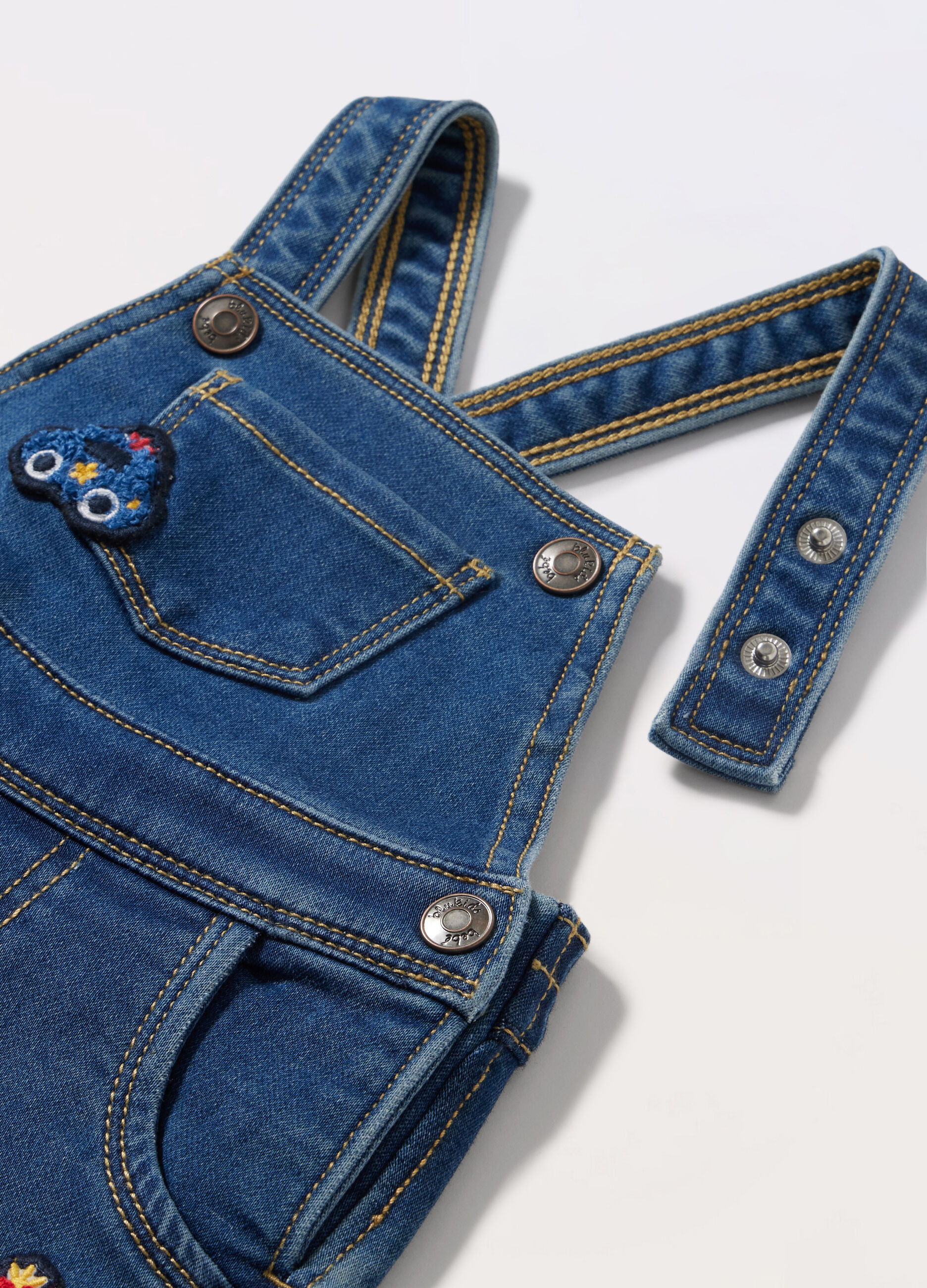 Salopette in french terry denim di misto cotone neonato_1