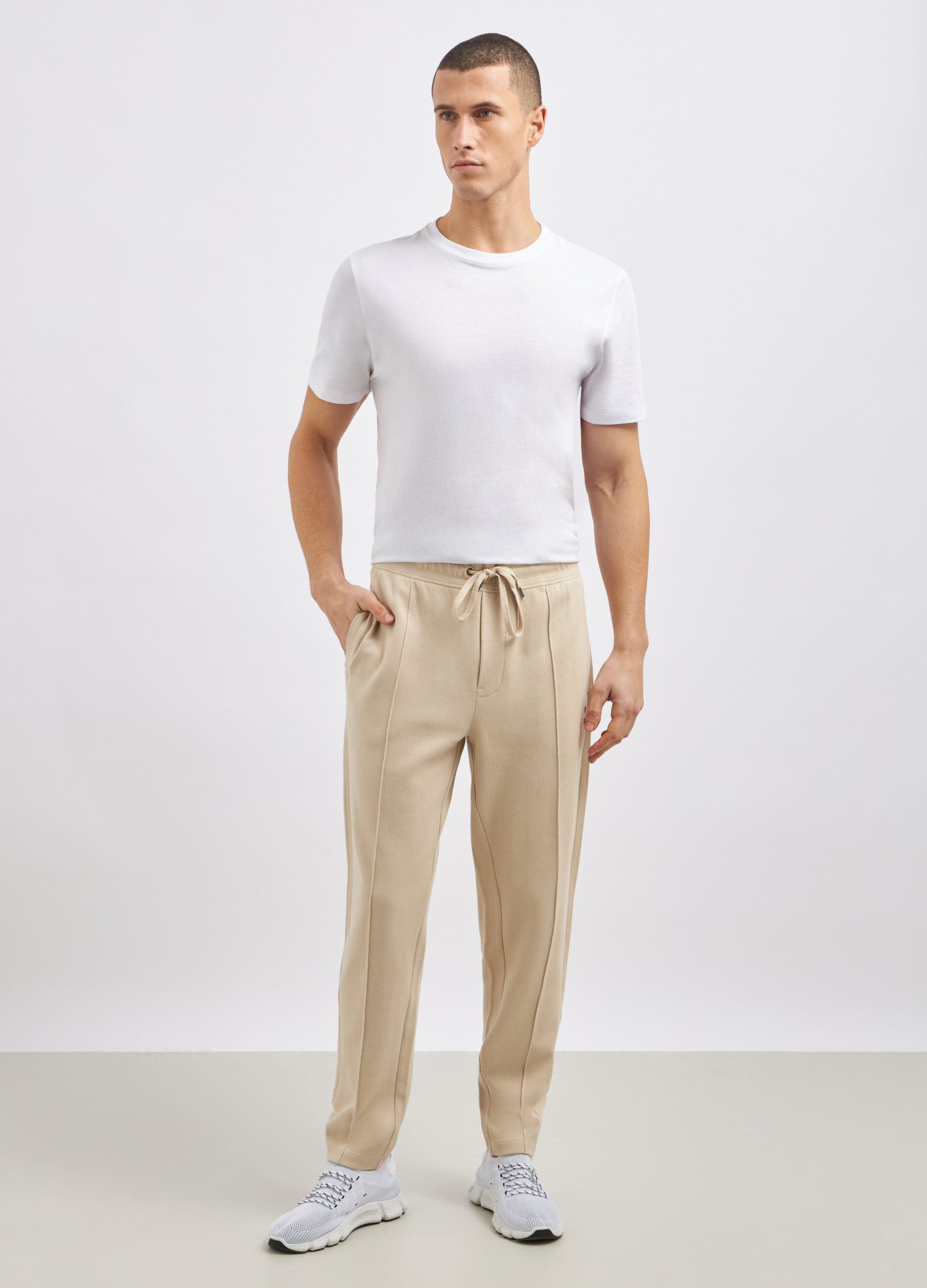 Jogger con pinces sul davanti in puro cotone uomo_0