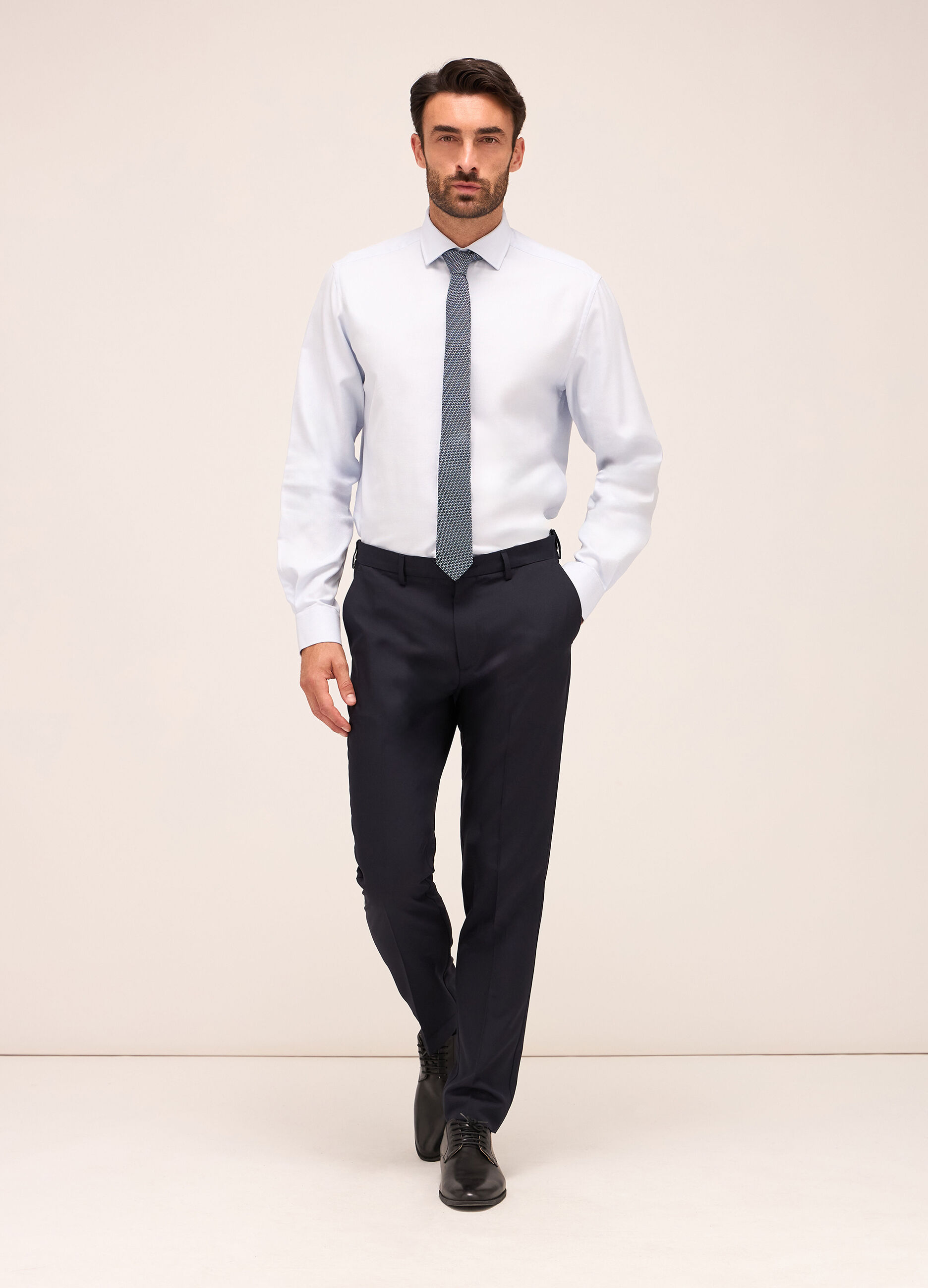 Pantaloni slim fit in tessuto tecnico uomo_0