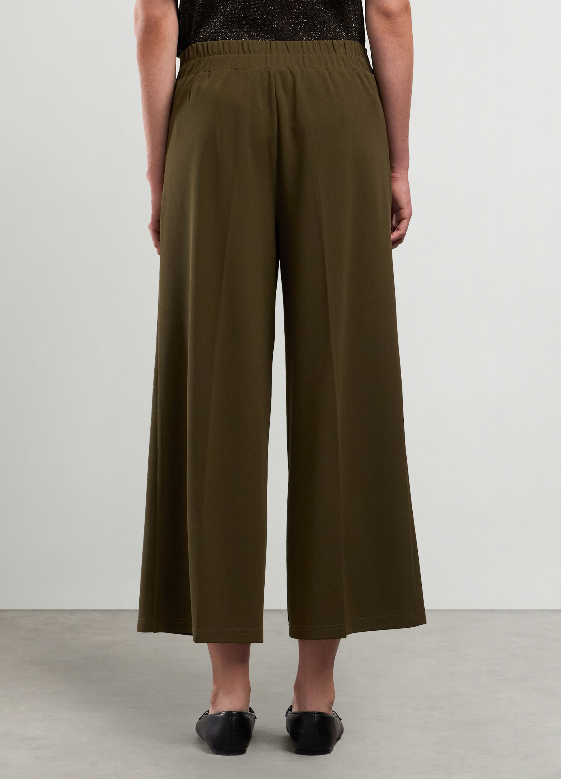 Pantaloni palazzo in tessuto stretch con cintura donna_1
