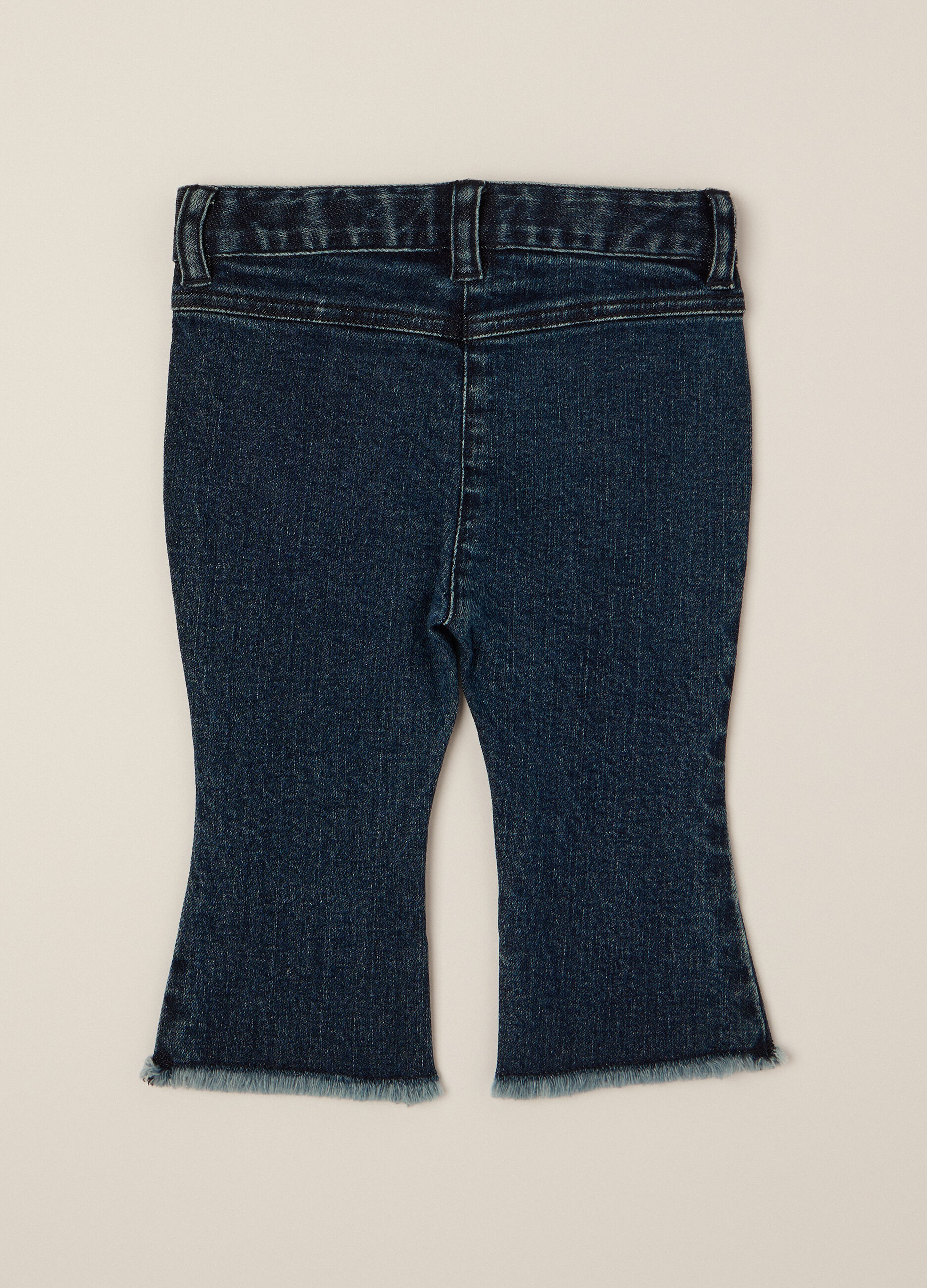 Pantaloni denim elasticizzati a zampa_1