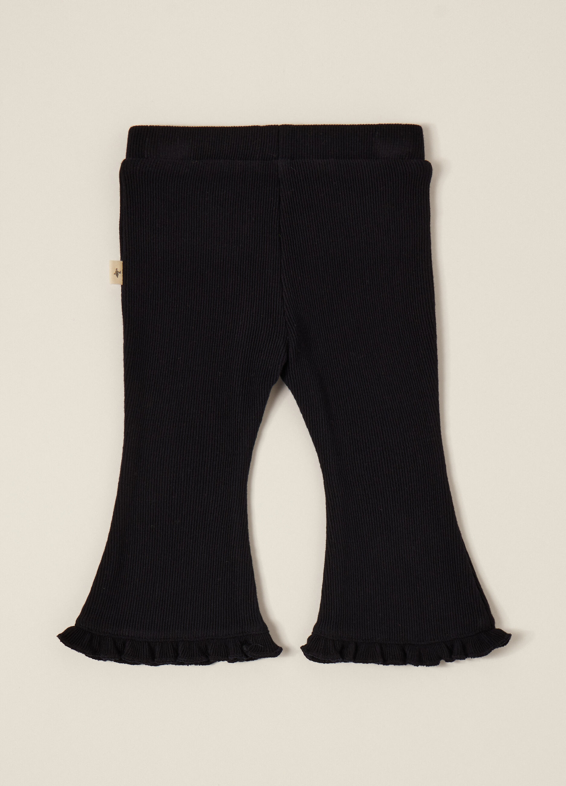 Pantaloni neri elasticizzati per neonata_1