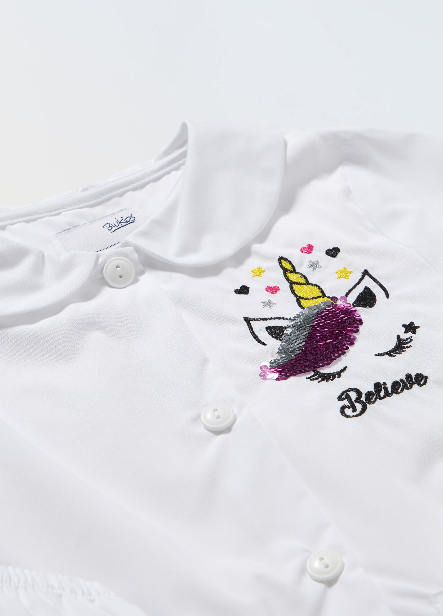 Grembiule con pallette bambina_1