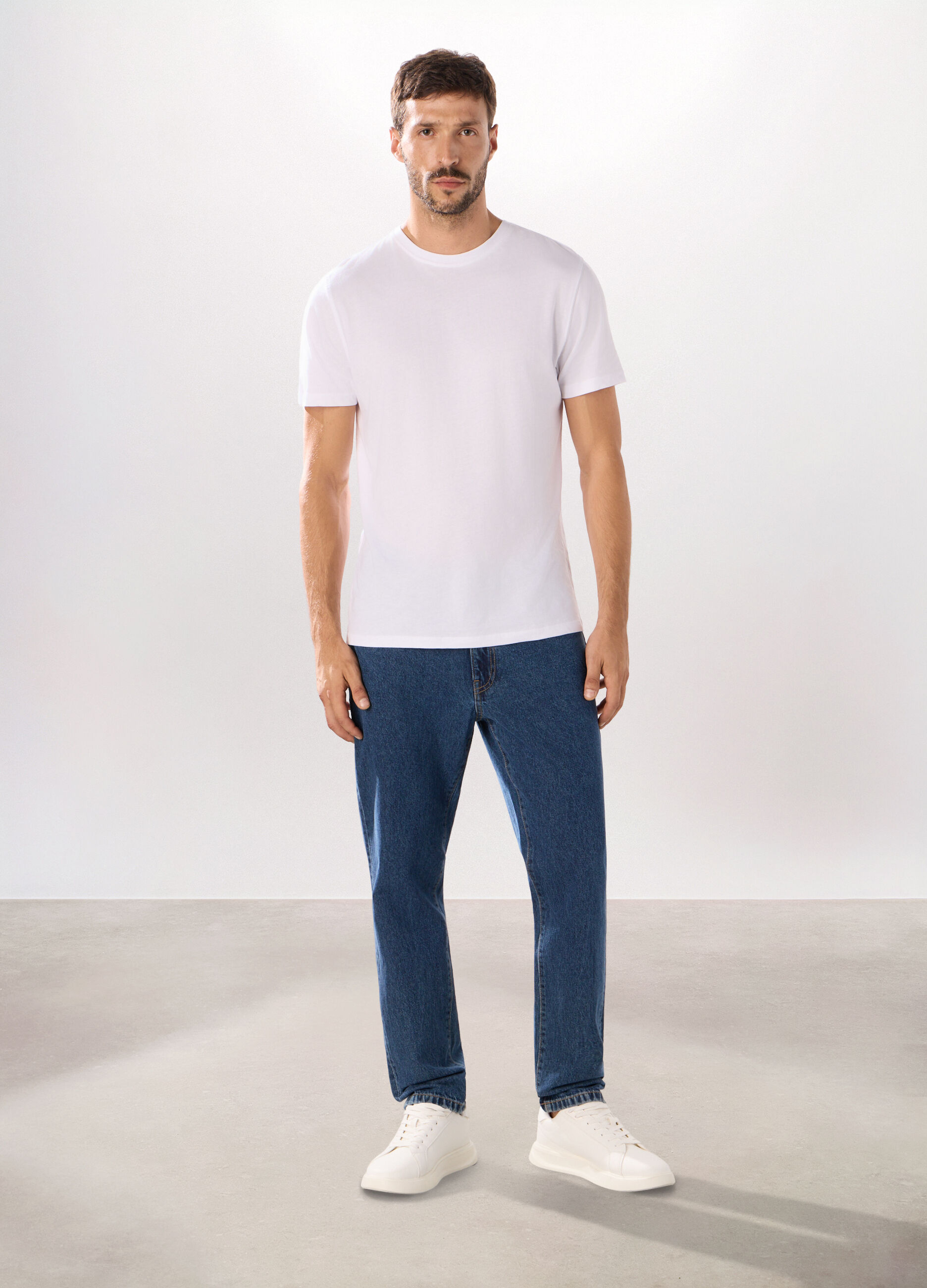 Jeans 5 tasche slim in denim di cotone uomo_0