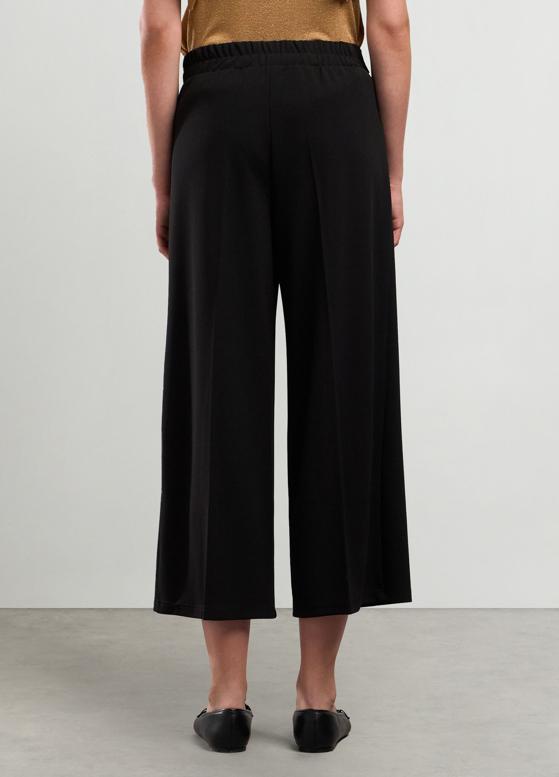 Pantaloni palazzo in tessuto stretch con cintura donna_1