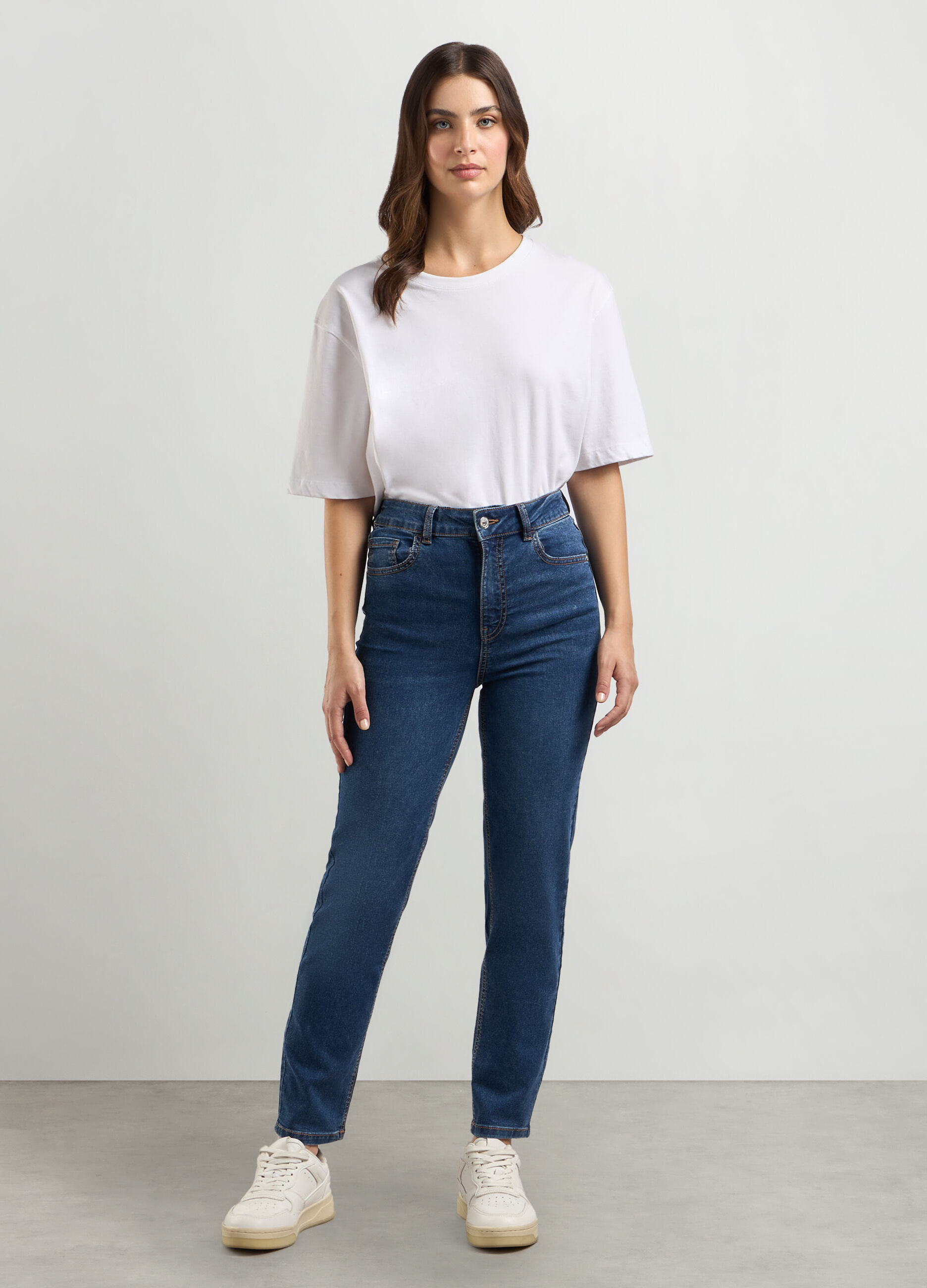 Pantaloni in denim di misto cotone stretch donna_0