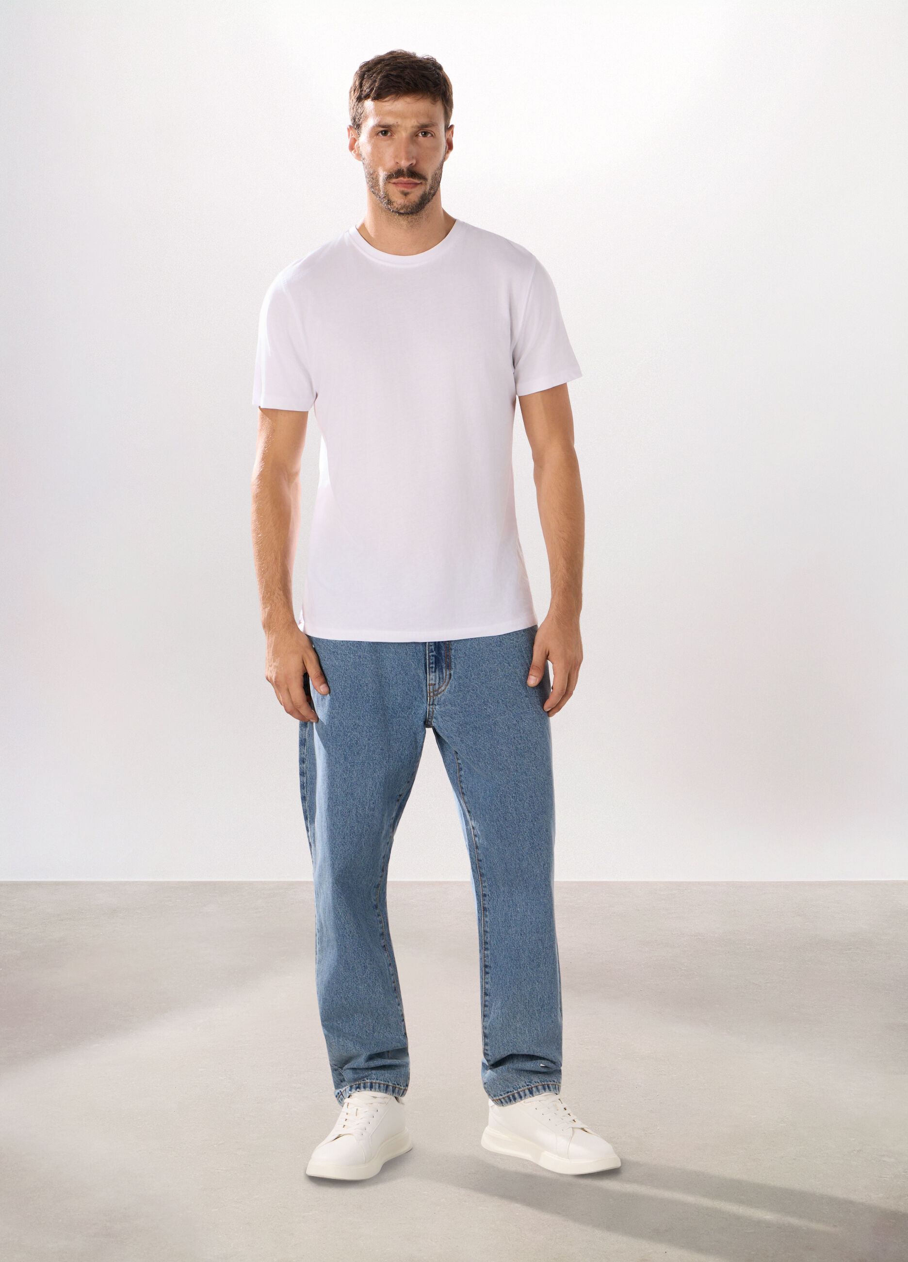 Jeans 5 tasche regular in denim di cotone uomo_0