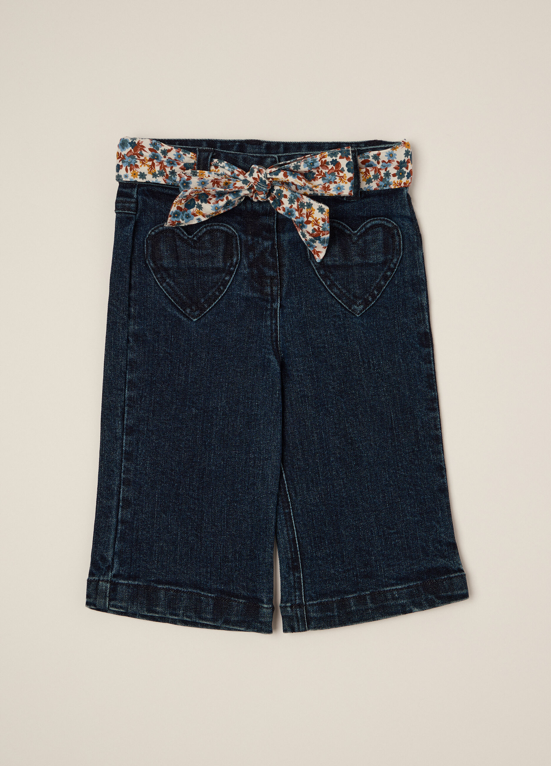 Pantaloni denim elasticizzati con dettagli floreali per bambina_1