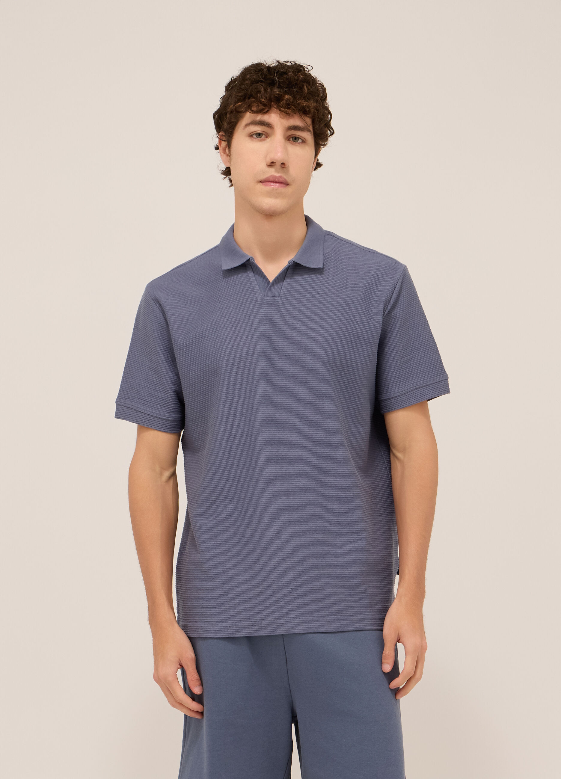 Polo in cotone a coste orizzontali uomo