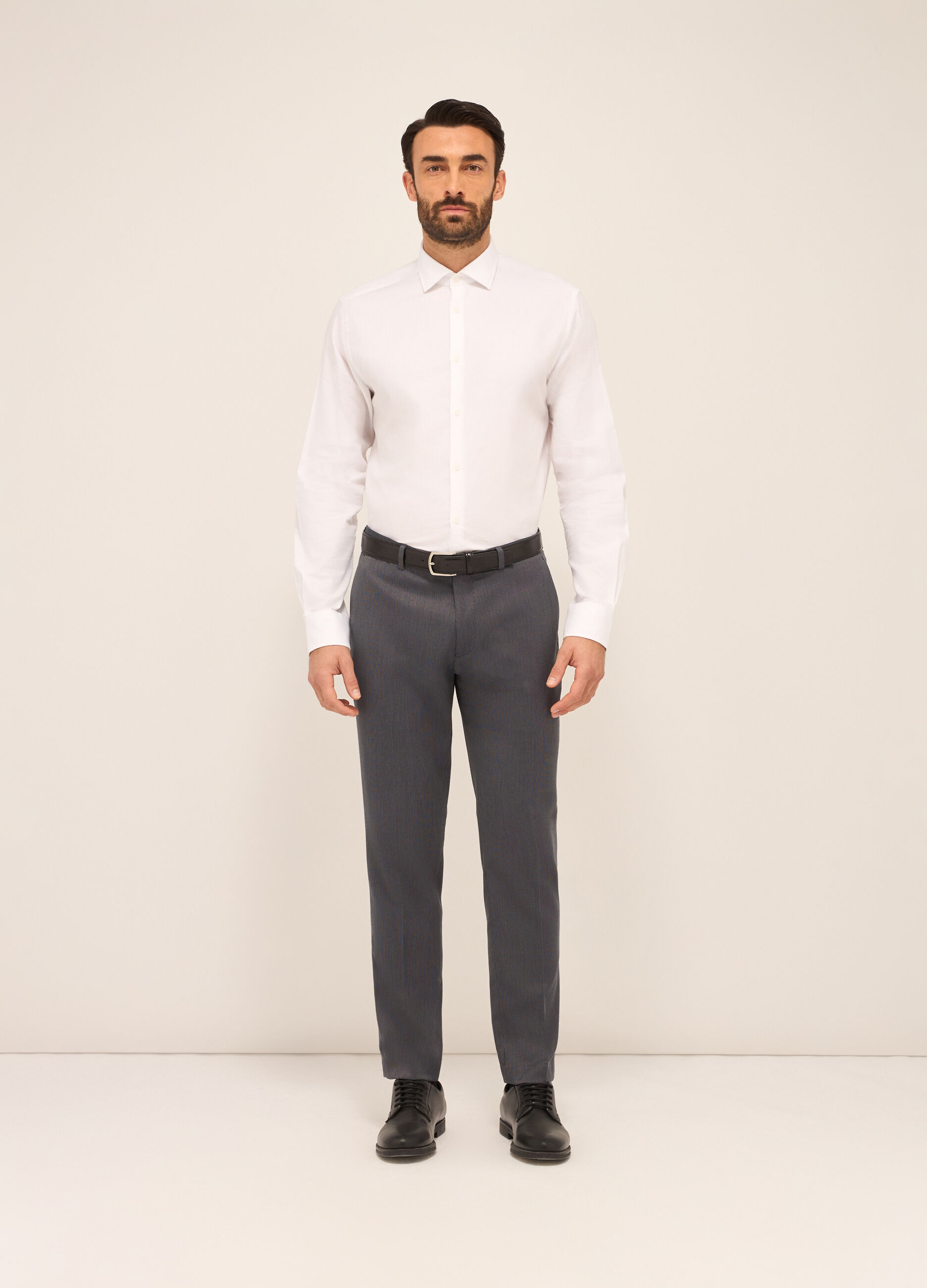 Pantaloni classici in tessuto stretch motivo optical uomo_0