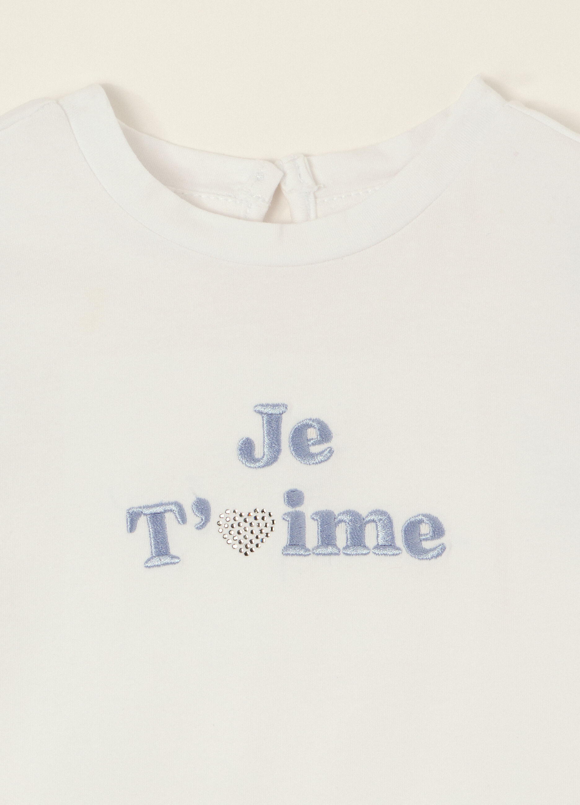 T-shirt bianca in cotone elasticizzato con volant_2