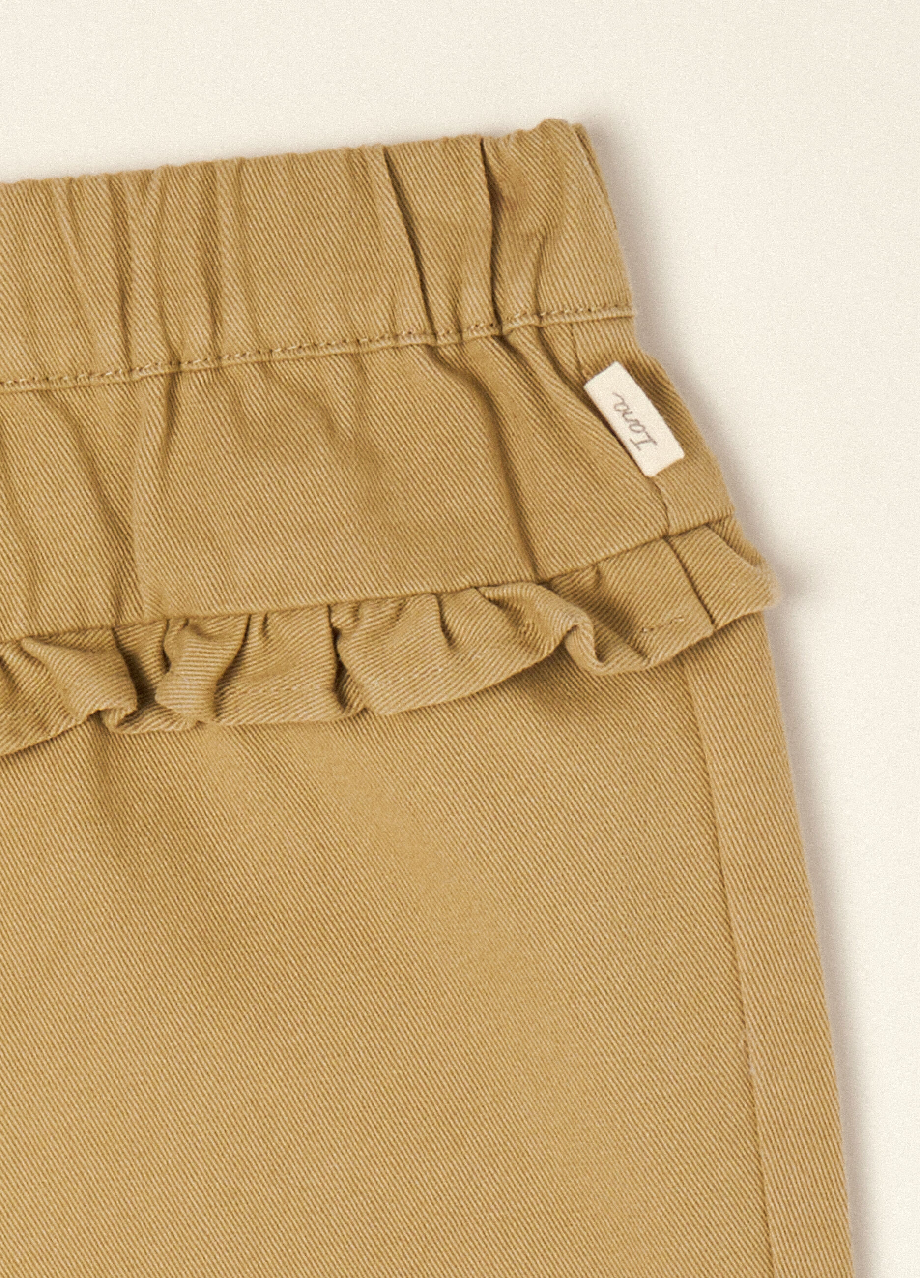 Pantaloni beige in puro cotone con volant_2