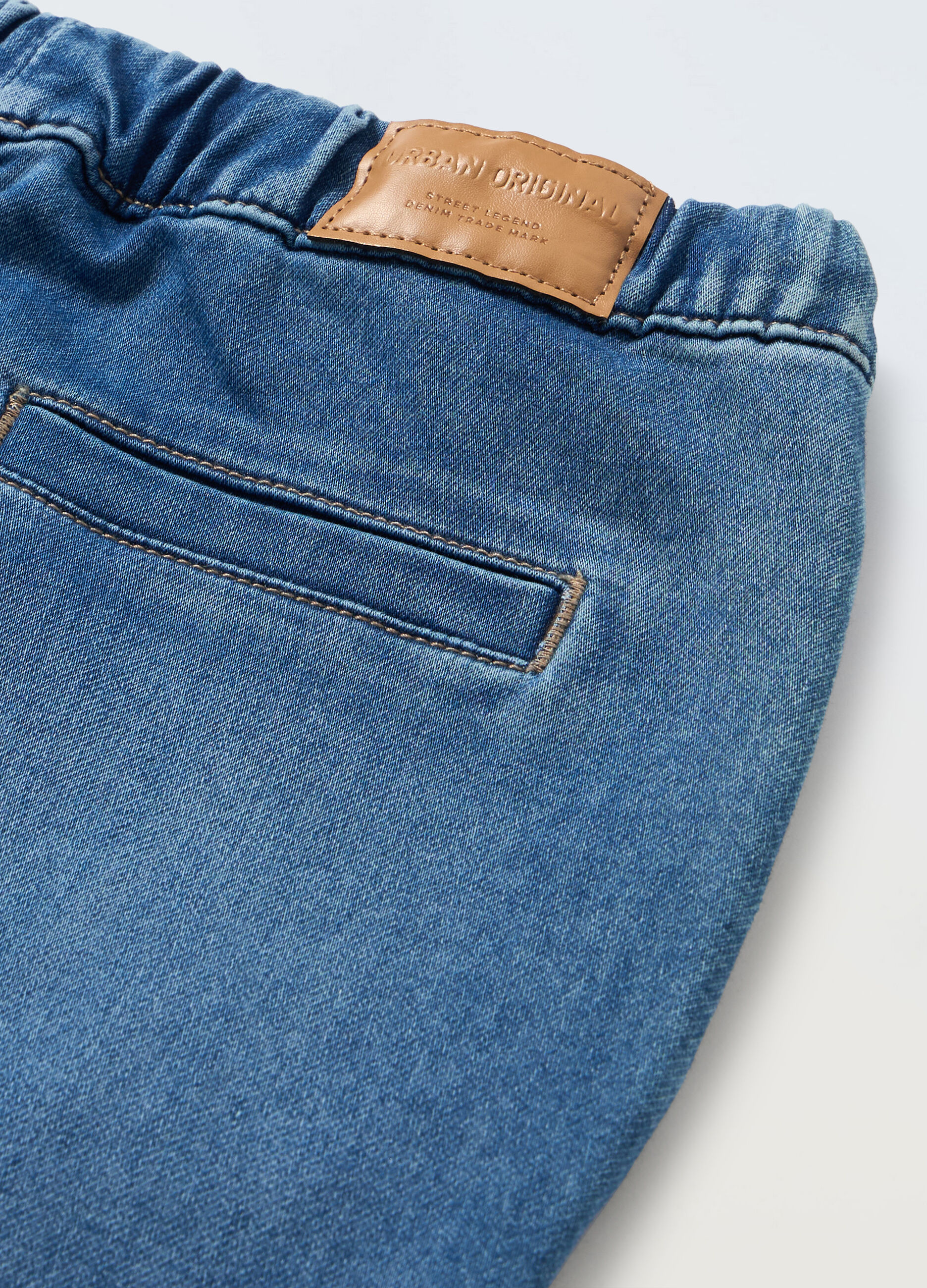 Jogger in denim di misto cotone ragazzo_1